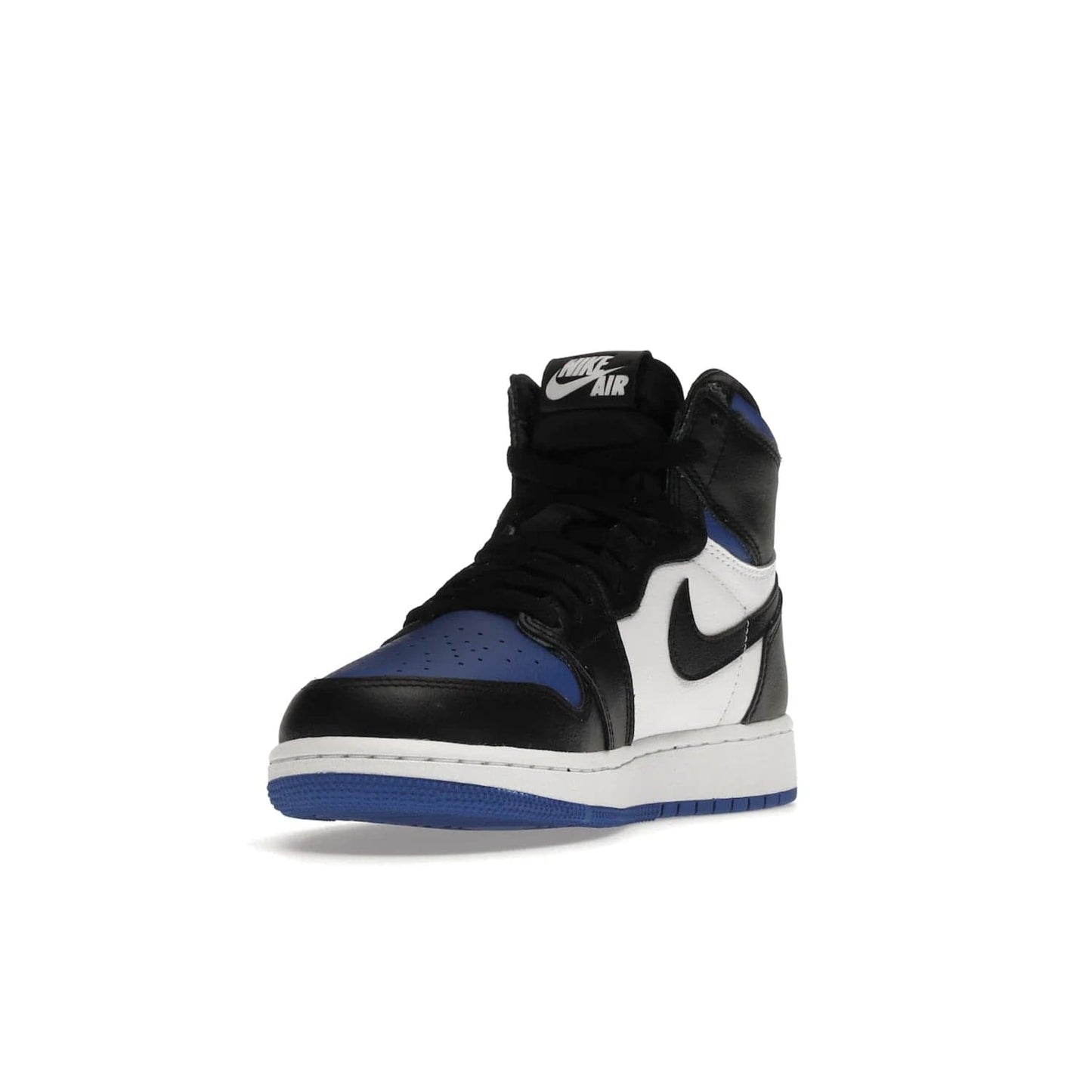 Jordan 1 Retro High Royal Toe (GS) - Image 13 - Only at www.BallersClubKickz.com - Take your sneaker wardrobe to the next level with the Jordan 1 Retro High Royal Toe (GS). Combining classic design with a luxurious white and royal blue leather upper, a textured black Swoosh and a tapered outsole. Stand out with the Air Jordan Wings logo near the heel.