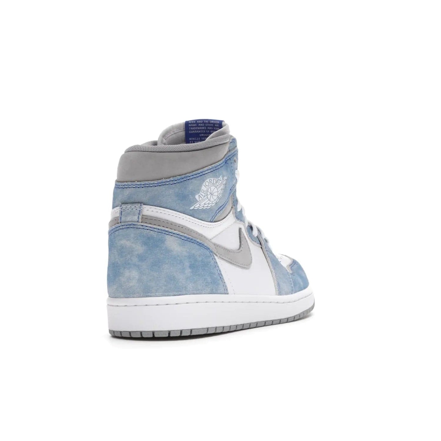Jordan 1 Retro High OG Hyper Royal - Image 31 - Only at www.BallersClubKickz.com - A classic design with modern materials, the Air Jordan 1 Retro High OG Hyper Royal features Hyper Royal suede, Light Smoke Grey Durabuck Swoosh and ankle panels, a woven Nike Air label and a crisp white "Wings" logo. Released in April 2021.