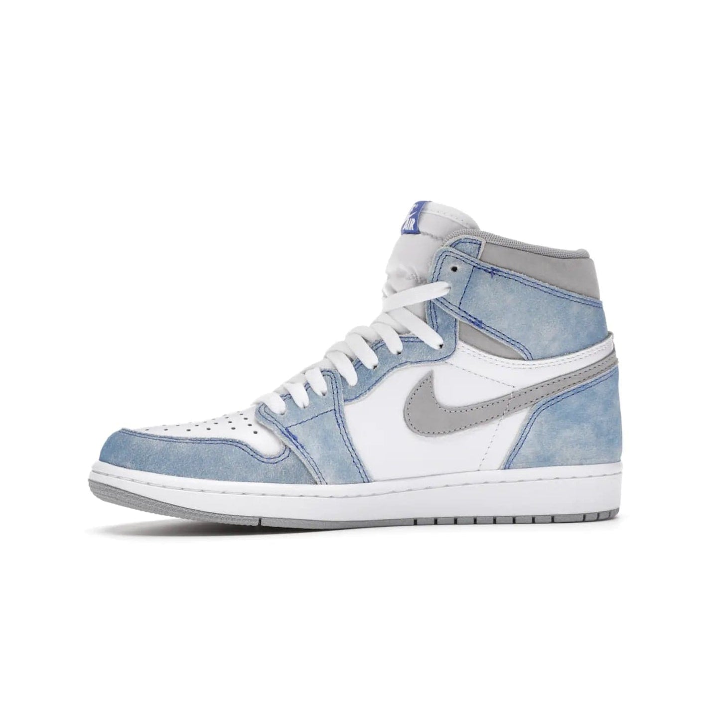 Jordan 1 Retro High OG Hyper Royal - Image 18 - Only at www.BallersClubKickz.com - A classic design with modern materials, the Air Jordan 1 Retro High OG Hyper Royal features Hyper Royal suede, Light Smoke Grey Durabuck Swoosh and ankle panels, a woven Nike Air label and a crisp white "Wings" logo. Released in April 2021.
