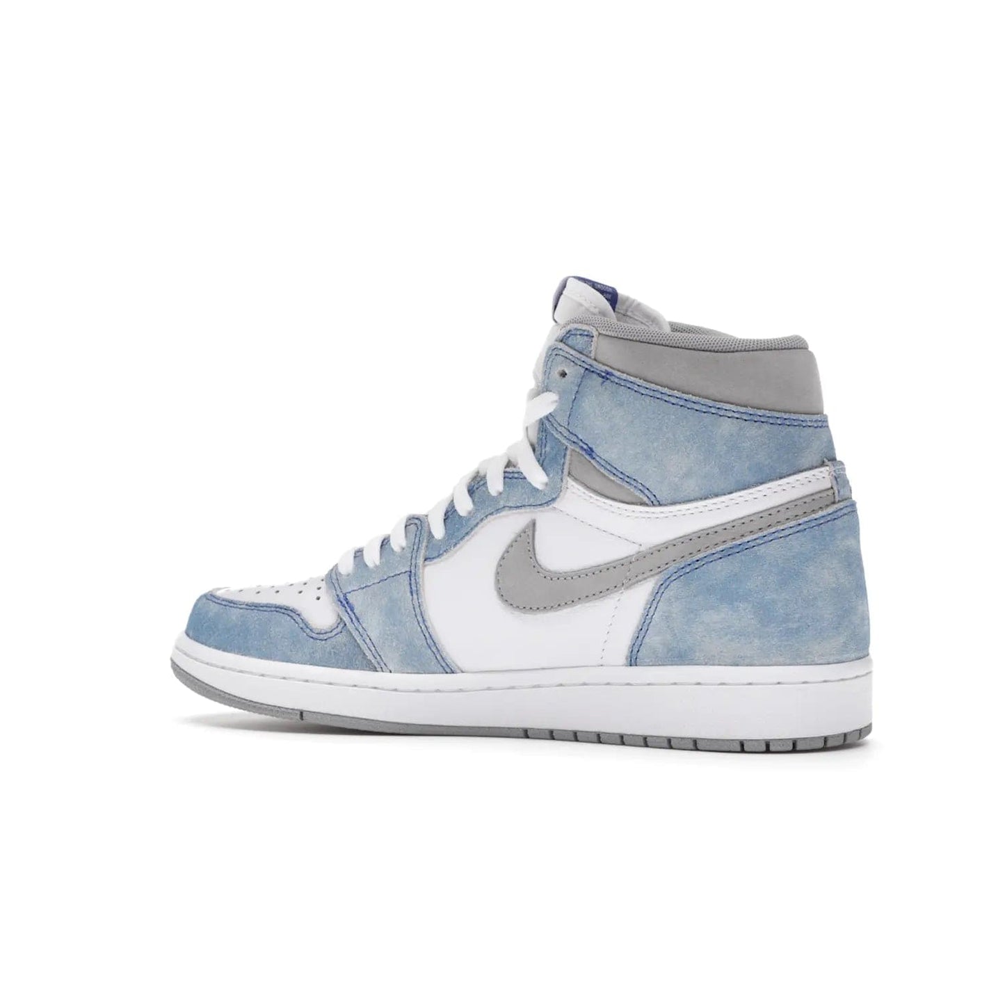 Jordan 1 Retro High OG Hyper Royal - Image 22 - Only at www.BallersClubKickz.com - A classic design with modern materials, the Air Jordan 1 Retro High OG Hyper Royal features Hyper Royal suede, Light Smoke Grey Durabuck Swoosh and ankle panels, a woven Nike Air label and a crisp white "Wings" logo. Released in April 2021.