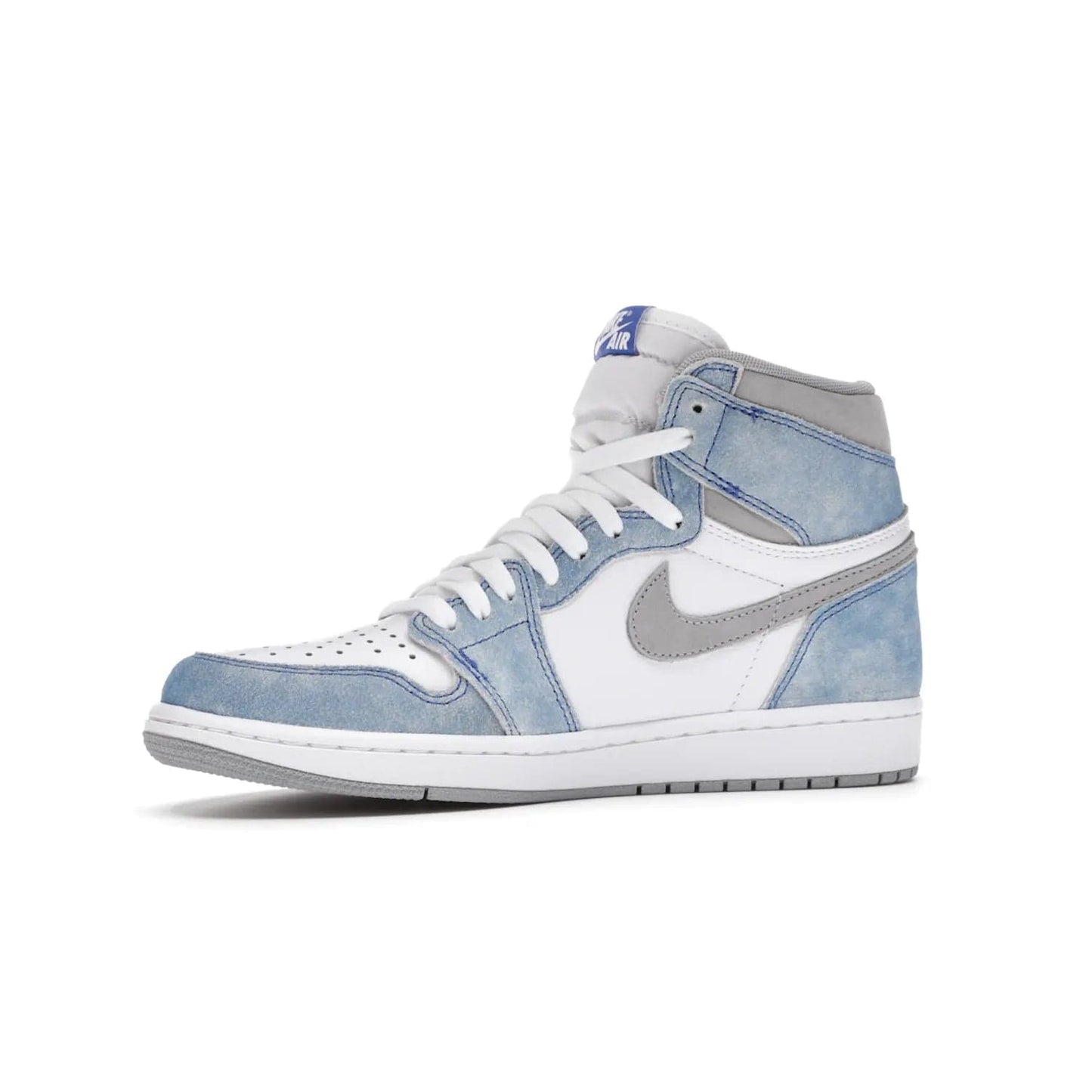 Jordan 1 Retro High OG Hyper Royal - Image 17 - Only at www.BallersClubKickz.com - A classic design with modern materials, the Air Jordan 1 Retro High OG Hyper Royal features Hyper Royal suede, Light Smoke Grey Durabuck Swoosh and ankle panels, a woven Nike Air label and a crisp white "Wings" logo. Released in April 2021.