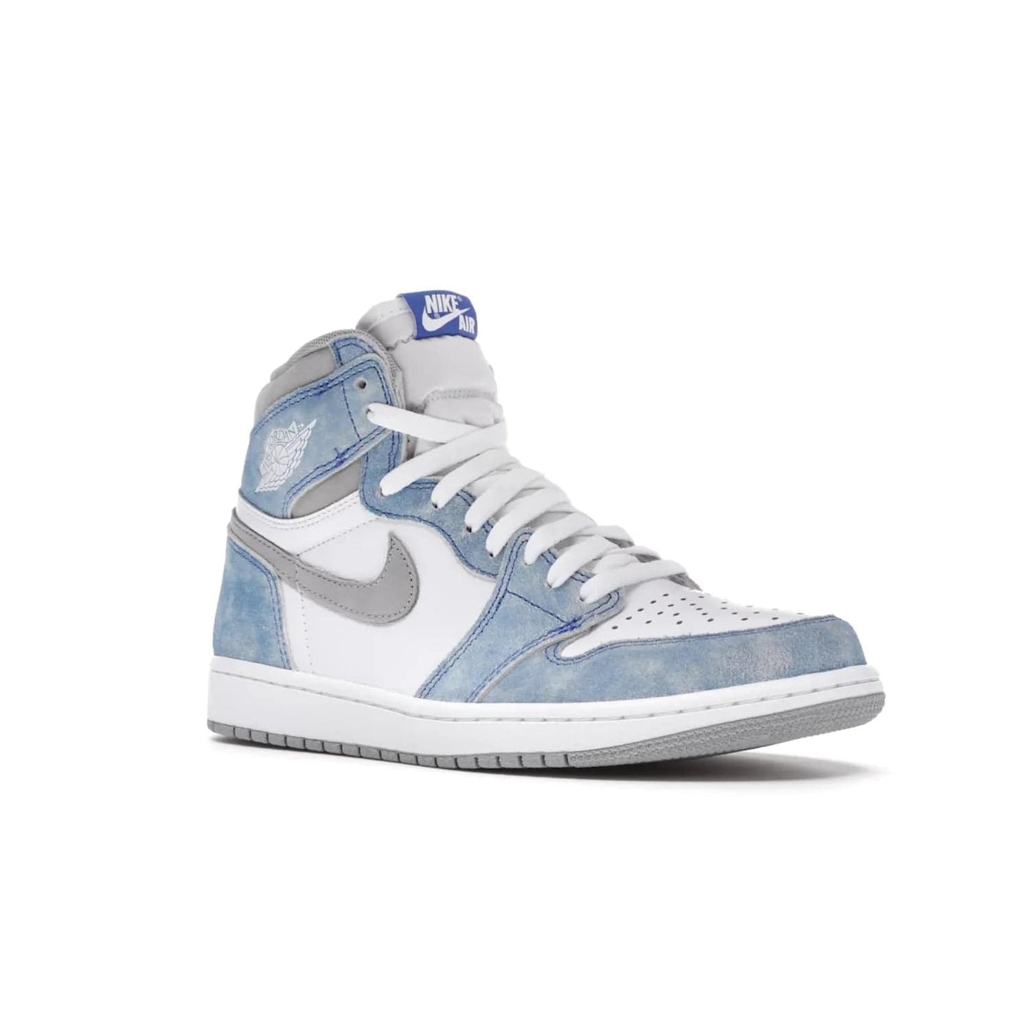 Jordan 1 Retro High OG Hyper Royal - Image 5 - Only at www.BallersClubKickz.com - A classic design with modern materials, the Air Jordan 1 Retro High OG Hyper Royal features Hyper Royal suede, Light Smoke Grey Durabuck Swoosh and ankle panels, a woven Nike Air label and a crisp white "Wings" logo. Released in April 2021.