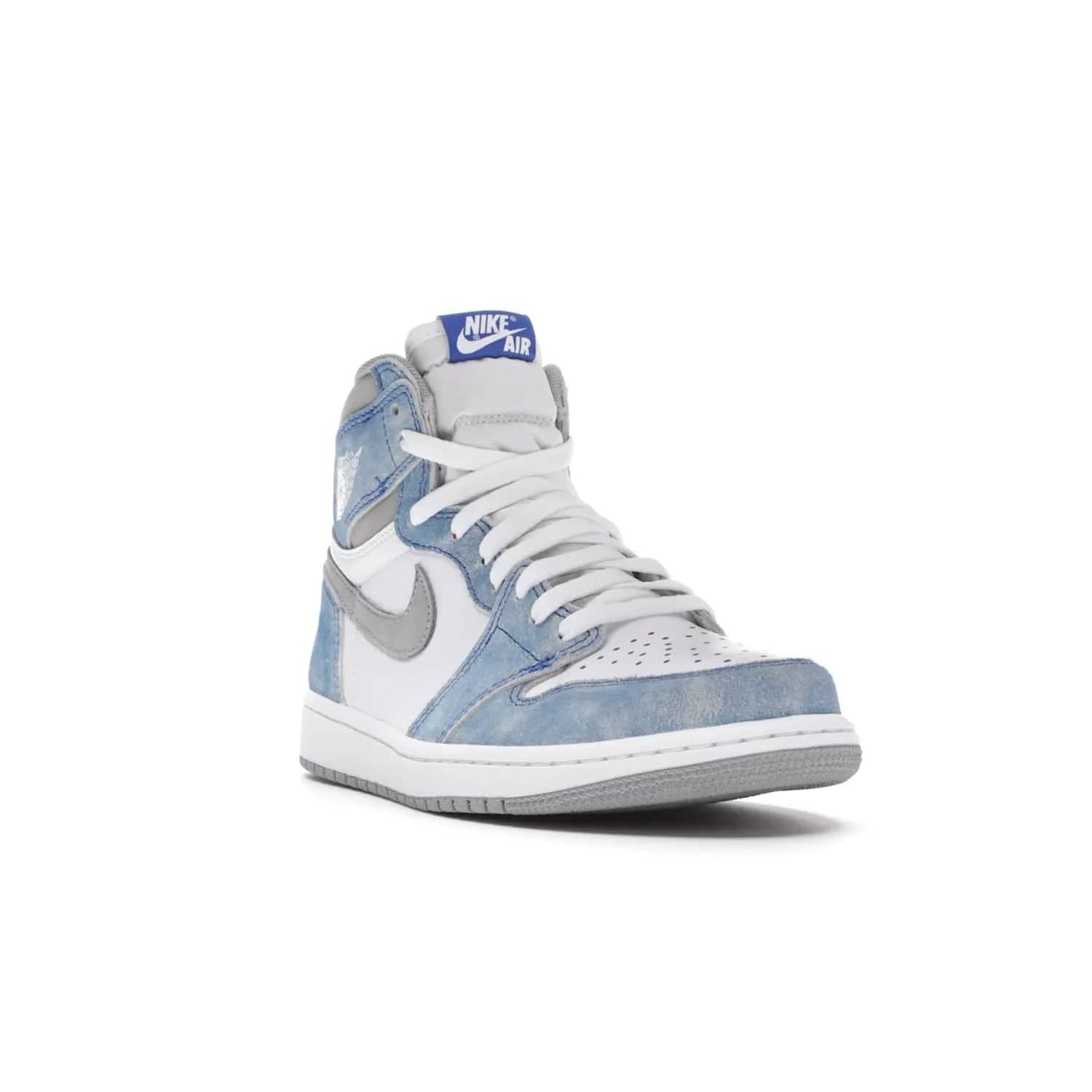 Jordan 1 Retro High OG Hyper Royal - Image 7 - Only at www.BallersClubKickz.com - A classic design with modern materials, the Air Jordan 1 Retro High OG Hyper Royal features Hyper Royal suede, Light Smoke Grey Durabuck Swoosh and ankle panels, a woven Nike Air label and a crisp white "Wings" logo. Released in April 2021.