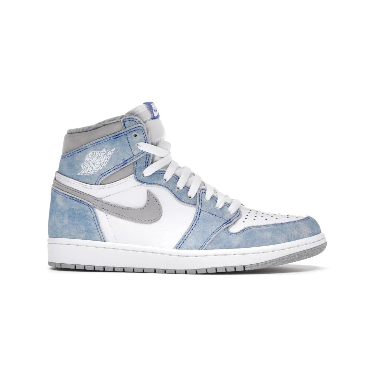 Jordan 1 Retro High OG Hyper Royal - Image 2 - Only at www.BallersClubKickz.com - A classic design with modern materials, the Air Jordan 1 Retro High OG Hyper Royal features Hyper Royal suede, Light Smoke Grey Durabuck Swoosh and ankle panels, a woven Nike Air label and a crisp white "Wings" logo. Released in April 2021.