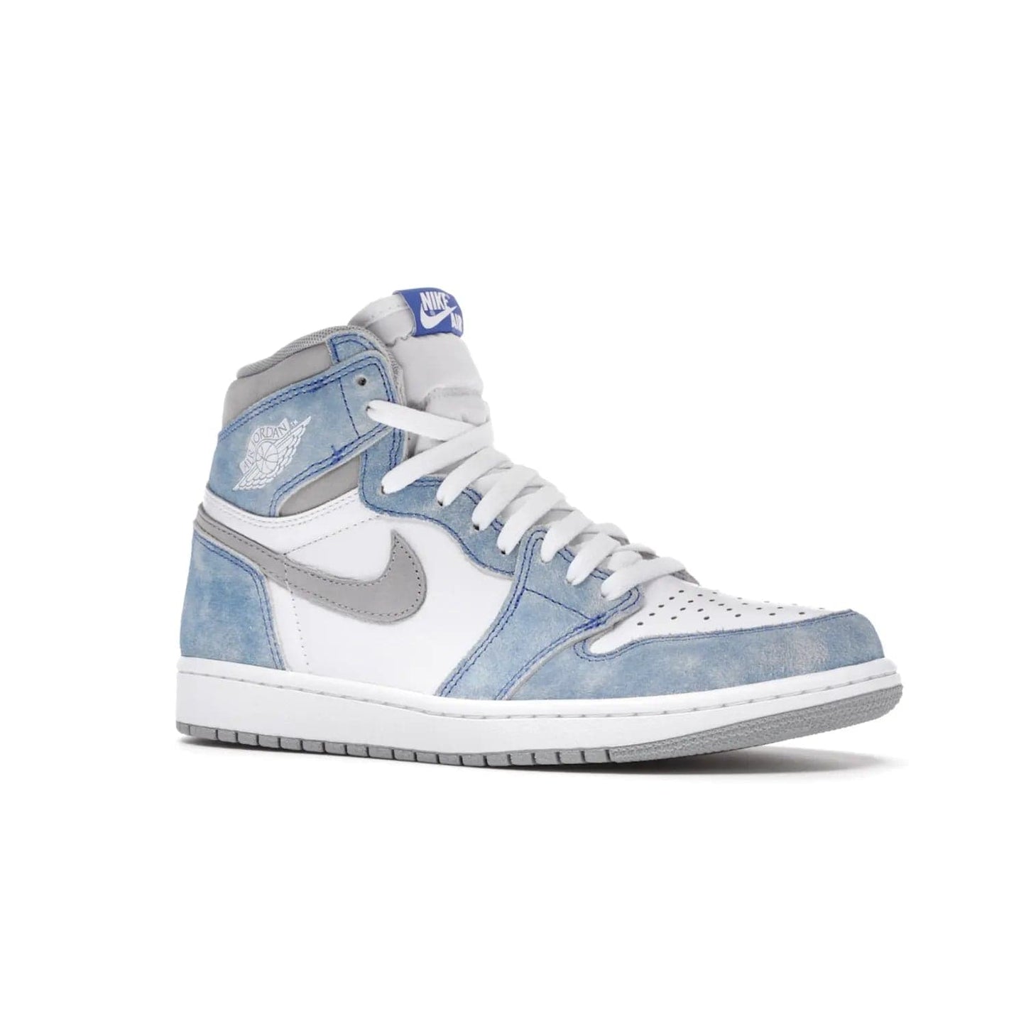 Jordan 1 Retro High OG Hyper Royal - Image 4 - Only at www.BallersClubKickz.com - A classic design with modern materials, the Air Jordan 1 Retro High OG Hyper Royal features Hyper Royal suede, Light Smoke Grey Durabuck Swoosh and ankle panels, a woven Nike Air label and a crisp white "Wings" logo. Released in April 2021.