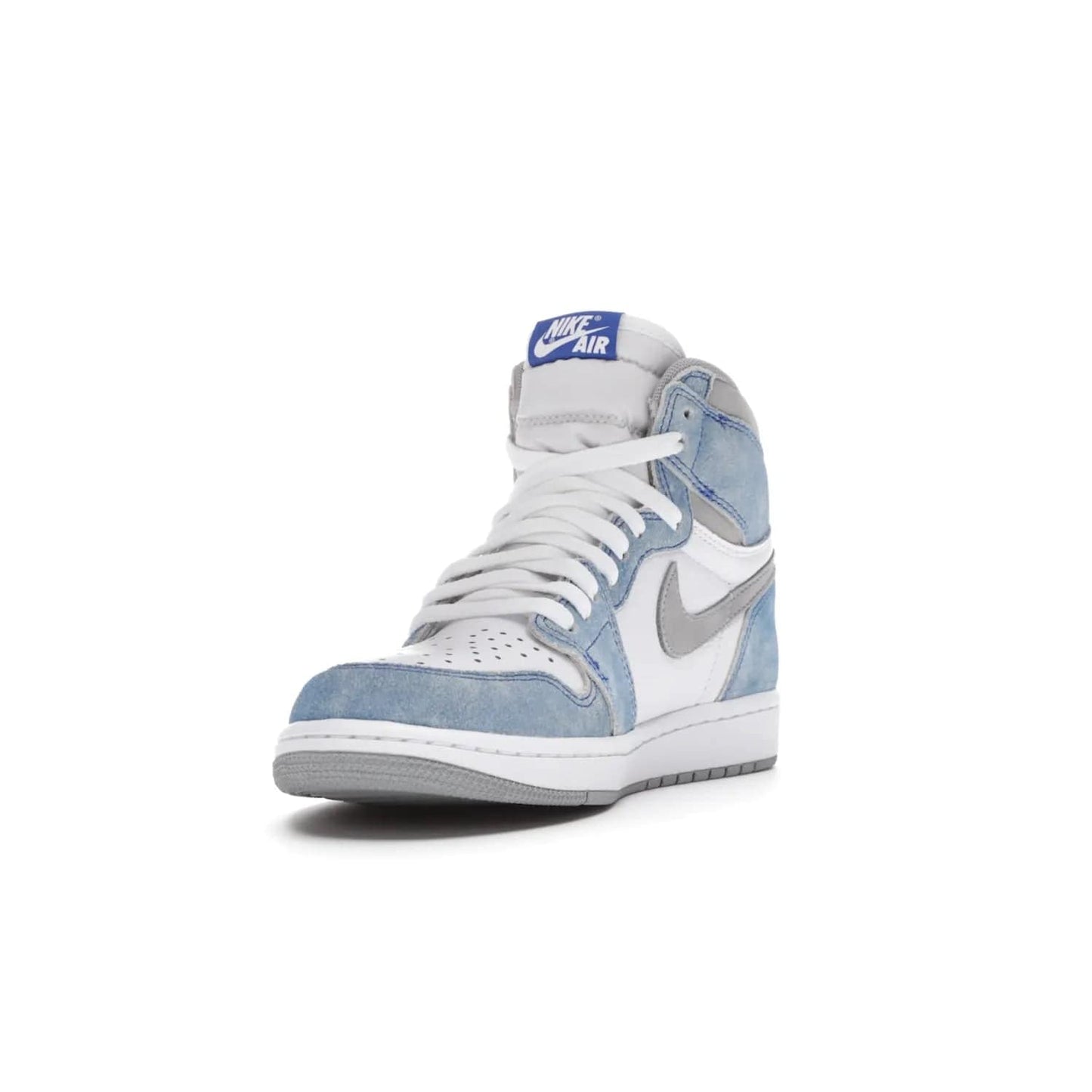 Jordan 1 Retro High OG Hyper Royal - Image 13 - Only at www.BallersClubKickz.com - A classic design with modern materials, the Air Jordan 1 Retro High OG Hyper Royal features Hyper Royal suede, Light Smoke Grey Durabuck Swoosh and ankle panels, a woven Nike Air label and a crisp white "Wings" logo. Released in April 2021.