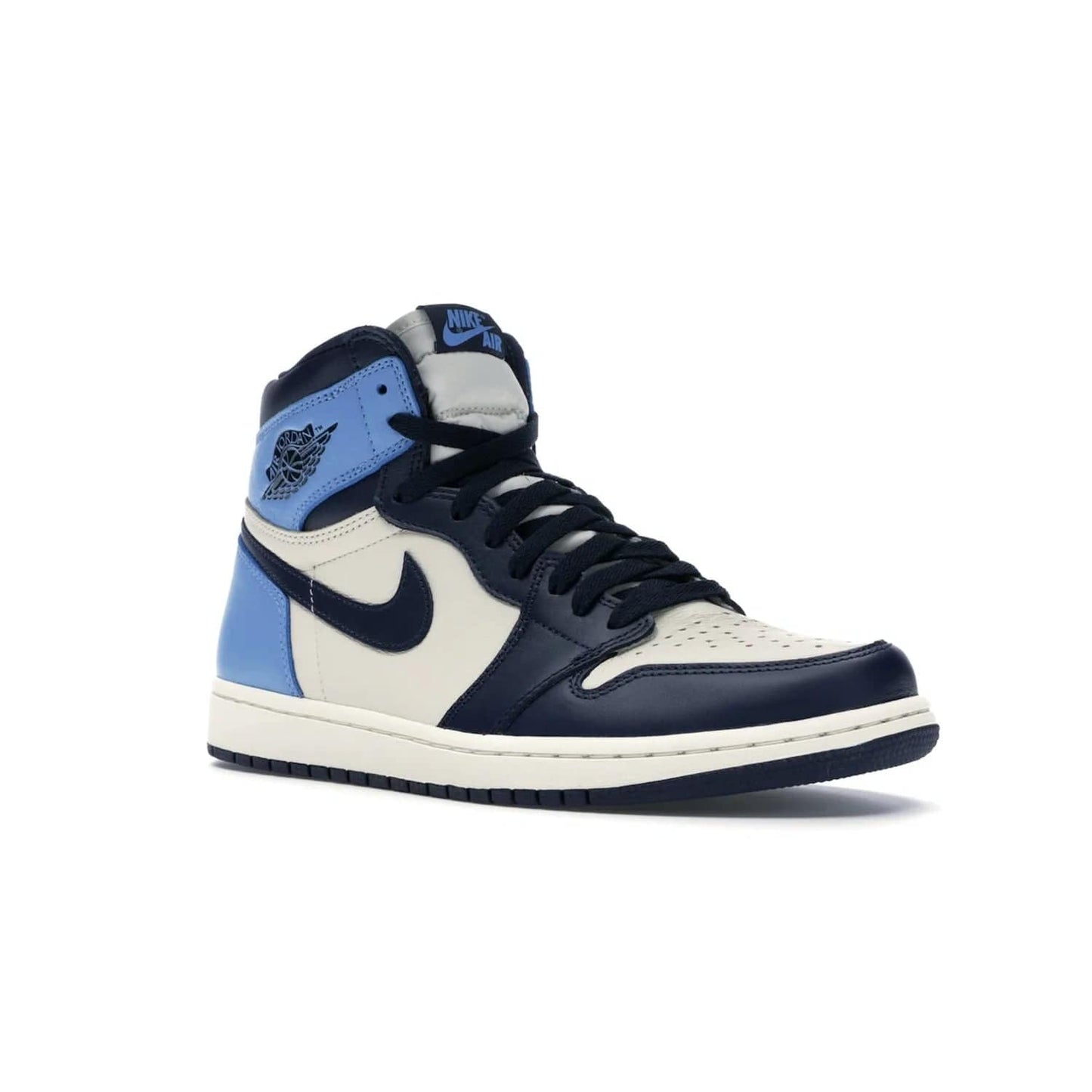 Jordan 1 Retro High Obsidian UNC - Image 5 - Only at www.BallersClubKickz.com - Bring a timeless classic to your wardrobe with the Air Jordan 1 Retro High "Obsidian/University Blue”. A full leather upper combines Obsidian and University Blue detailing for a retro Jordan style. Stitched Jumpman logo pays tribute to UNC. Experience classic style with a timeless sneaker.