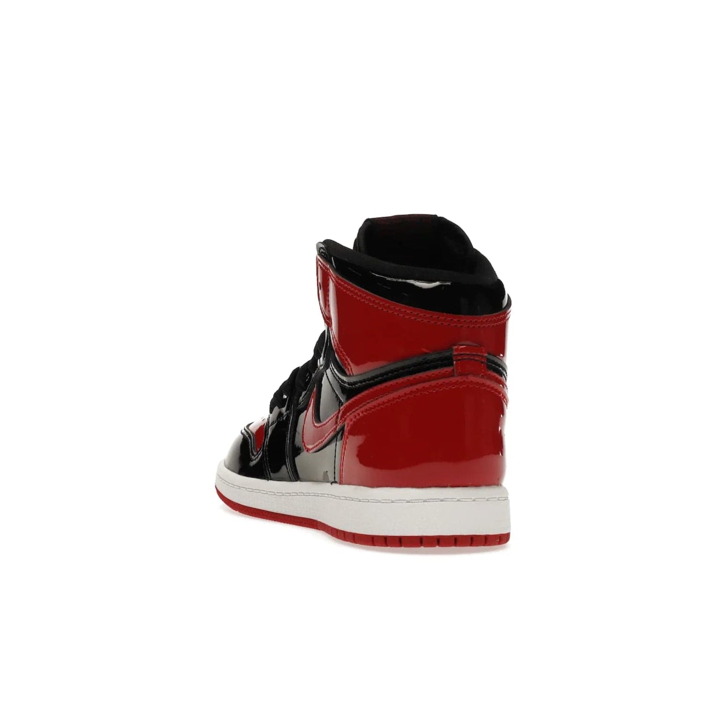 Jordan 1 Retro High OG Patent Bred (PS) - Image 26 - Only at www.BallersClubKickz.com - A timeless classic, the Air Jordan 1 Retro High OG Bred Patent PS features patent leather and debossed Air Jordan Wings motifs. Classic black, white and varsity red colourway on a comfortable and stylish sneaker. Shop this must-have now.