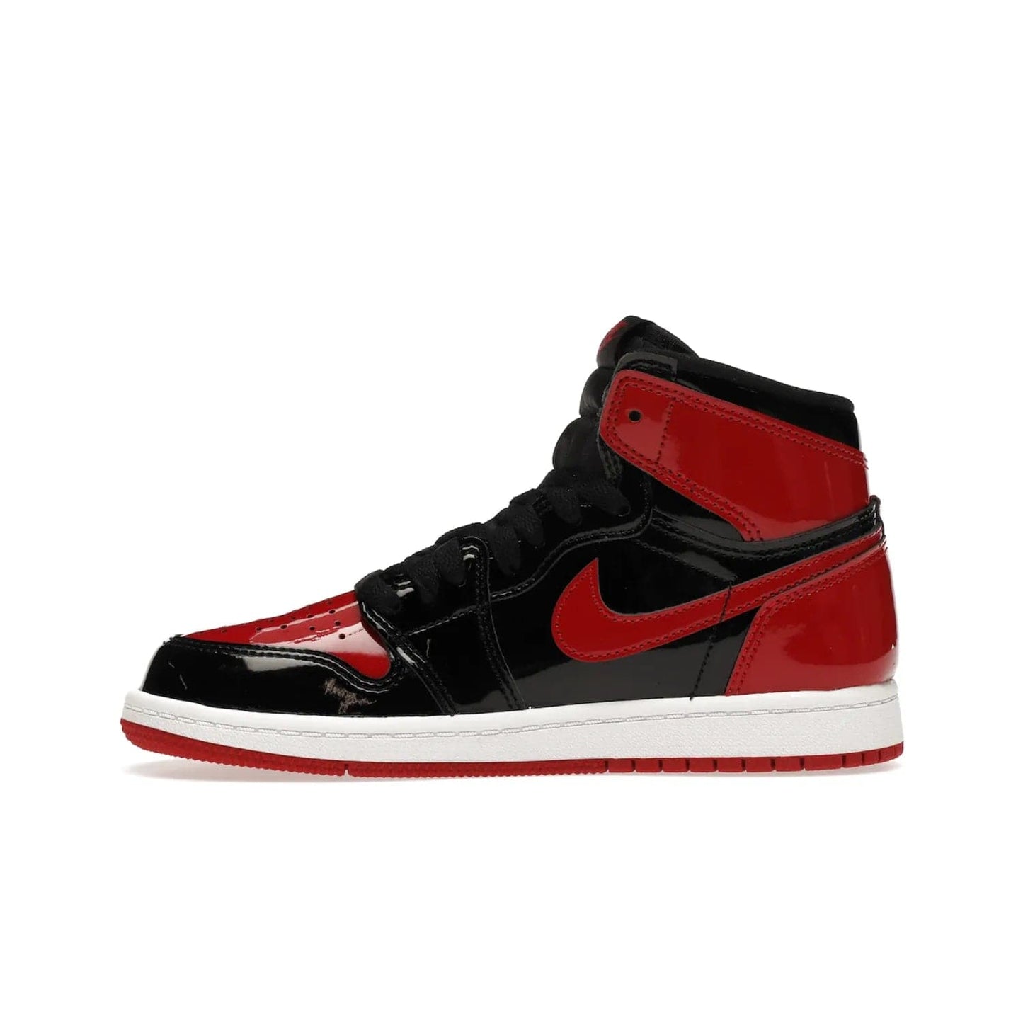 Jordan 1 Retro High OG Patent Bred (PS) - Image 19 - Only at www.BallersClubKickz.com - A timeless classic, the Air Jordan 1 Retro High OG Bred Patent PS features patent leather and debossed Air Jordan Wings motifs. Classic black, white and varsity red colourway on a comfortable and stylish sneaker. Shop this must-have now.