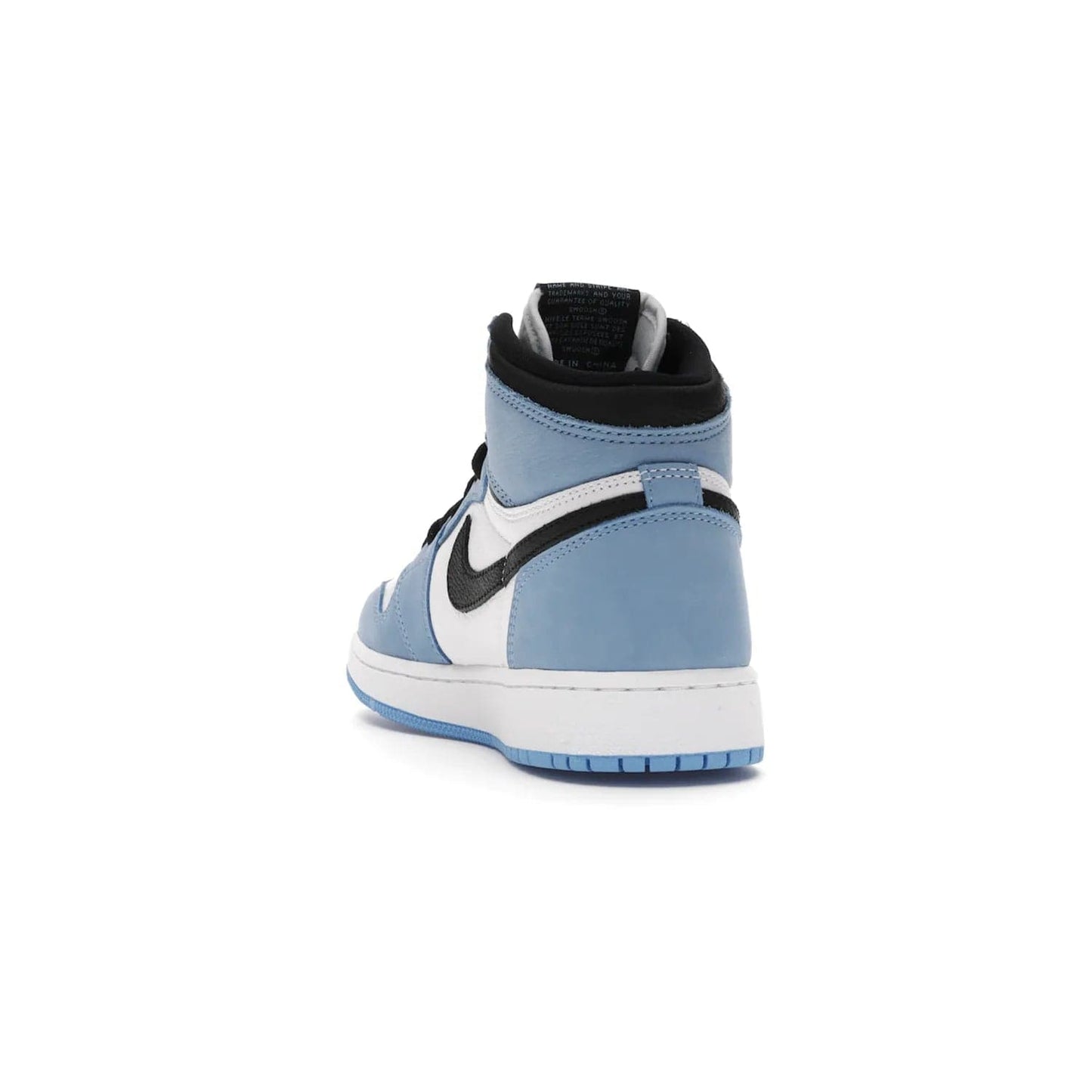 Jordan 1 Retro High White University Blue Black (GS) - Image 26 - Only at www.BallersClubKickz.com - Air Jordan 1 Retro High White University Blue Black GS: the latest offering from the iconic Air Jordan 1 line. White tumbled leather upper with University Blue overlays and black detailing. University Blue outsole and white midsole. March 6 release.