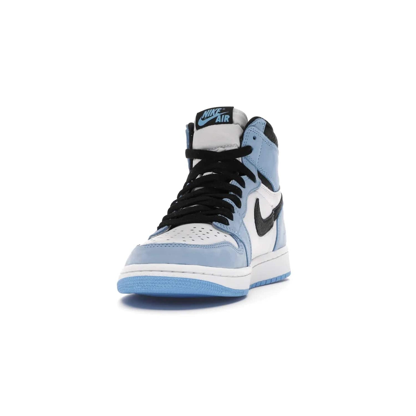 Jordan 1 Retro High White University Blue Black - Image 12 - Only at www.BallersClubKickz.com - Shop the Air Jordan 1 Retro High University Blue. White and black tumbled leather upper with University Blue Durabuck overlays, Nike Air woven label, Air Jordan Wings Logo, white midsole and University Blue outsole. Available March 2021.