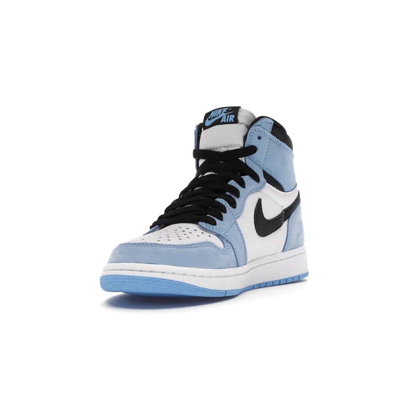 Jordan 1 Retro High White University Blue Black - Image 13 - Only at www.BallersClubKickz.com - Shop the Air Jordan 1 Retro High University Blue. White and black tumbled leather upper with University Blue Durabuck overlays, Nike Air woven label, Air Jordan Wings Logo, white midsole and University Blue outsole. Available March 2021.