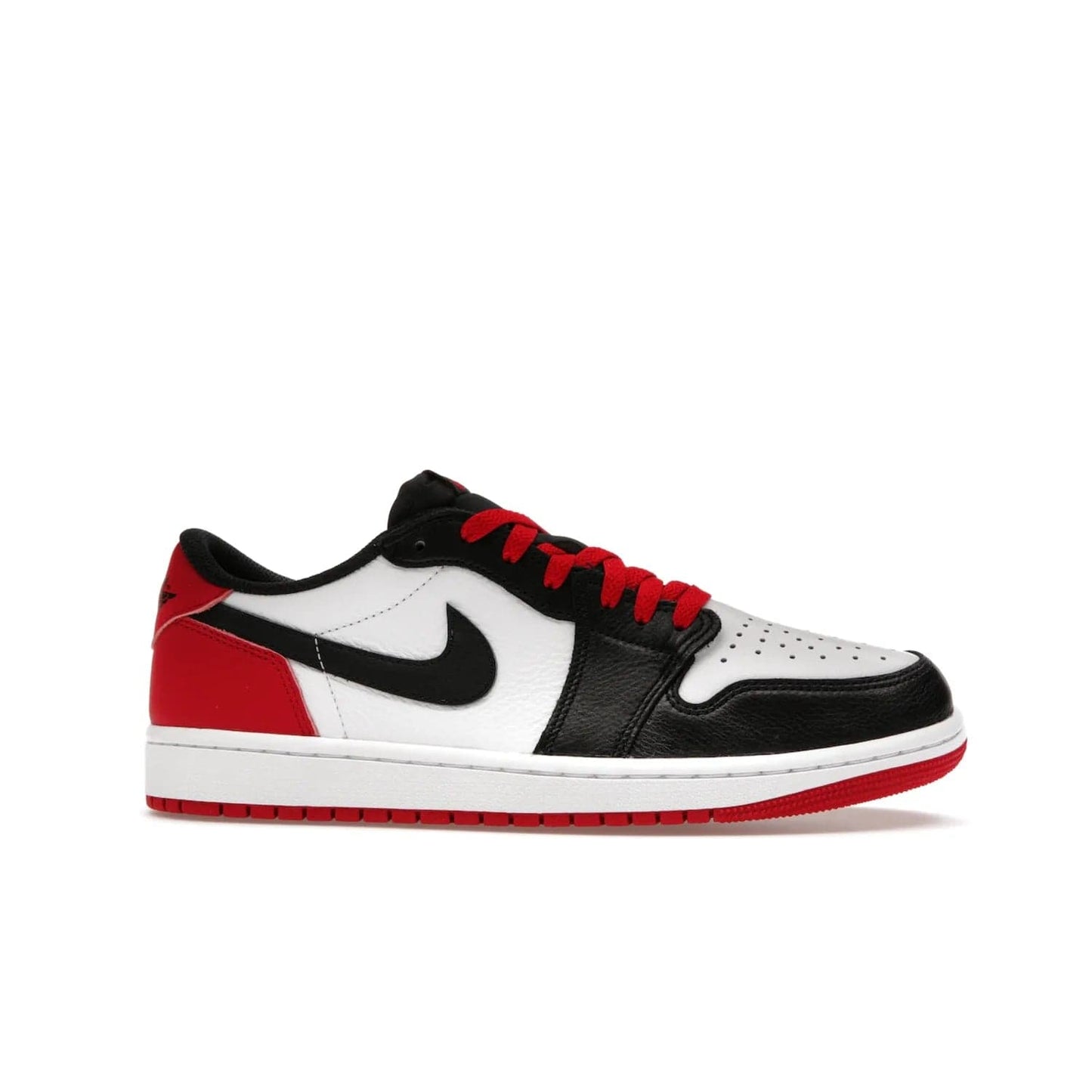 Jordan 1 Retro Low OG Black Toe (2023) - Image 2 - Only at www.BallersClubKickz.com - Upgrade your wardrobe with the Jordan 1 Retro Low OG Black Toe featuring a classic black and white upper and dynamic red heel counter. Eye-catching white midsole and iconic black Swoosh and Wings complete the timeless yet modern look. Shop now to own this iconic shoe!
