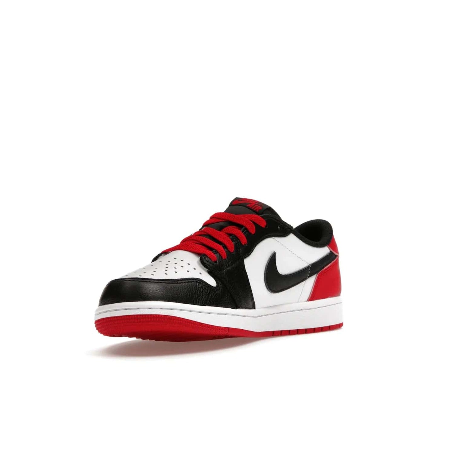 Jordan 1 Retro Low OG Black Toe (2023) - Image 14 - Only at www.BallersClubKickz.com - Upgrade your wardrobe with the Jordan 1 Retro Low OG Black Toe featuring a classic black and white upper and dynamic red heel counter. Eye-catching white midsole and iconic black Swoosh and Wings complete the timeless yet modern look. Shop now to own this iconic shoe!