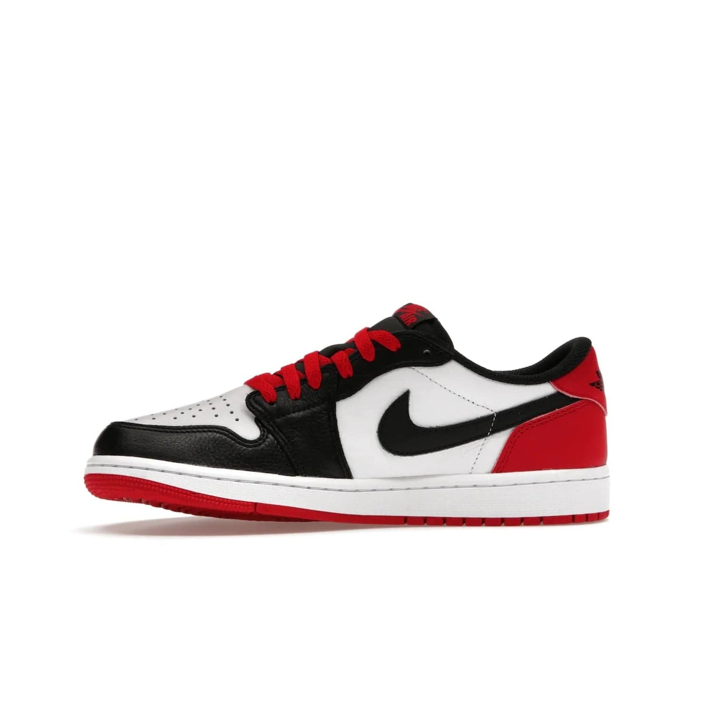 Jordan 1 Retro Low OG Black Toe (2023) - Image 18 - Only at www.BallersClubKickz.com - Upgrade your wardrobe with the Jordan 1 Retro Low OG Black Toe featuring a classic black and white upper and dynamic red heel counter. Eye-catching white midsole and iconic black Swoosh and Wings complete the timeless yet modern look. Shop now to own this iconic shoe!