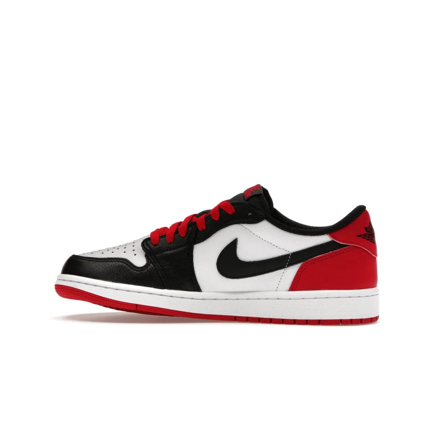 Jordan 1 Retro Low OG Black Toe (2023) - Image 20 - Only at www.BallersClubKickz.com - Upgrade your wardrobe with the Jordan 1 Retro Low OG Black Toe featuring a classic black and white upper and dynamic red heel counter. Eye-catching white midsole and iconic black Swoosh and Wings complete the timeless yet modern look. Shop now to own this iconic shoe!
