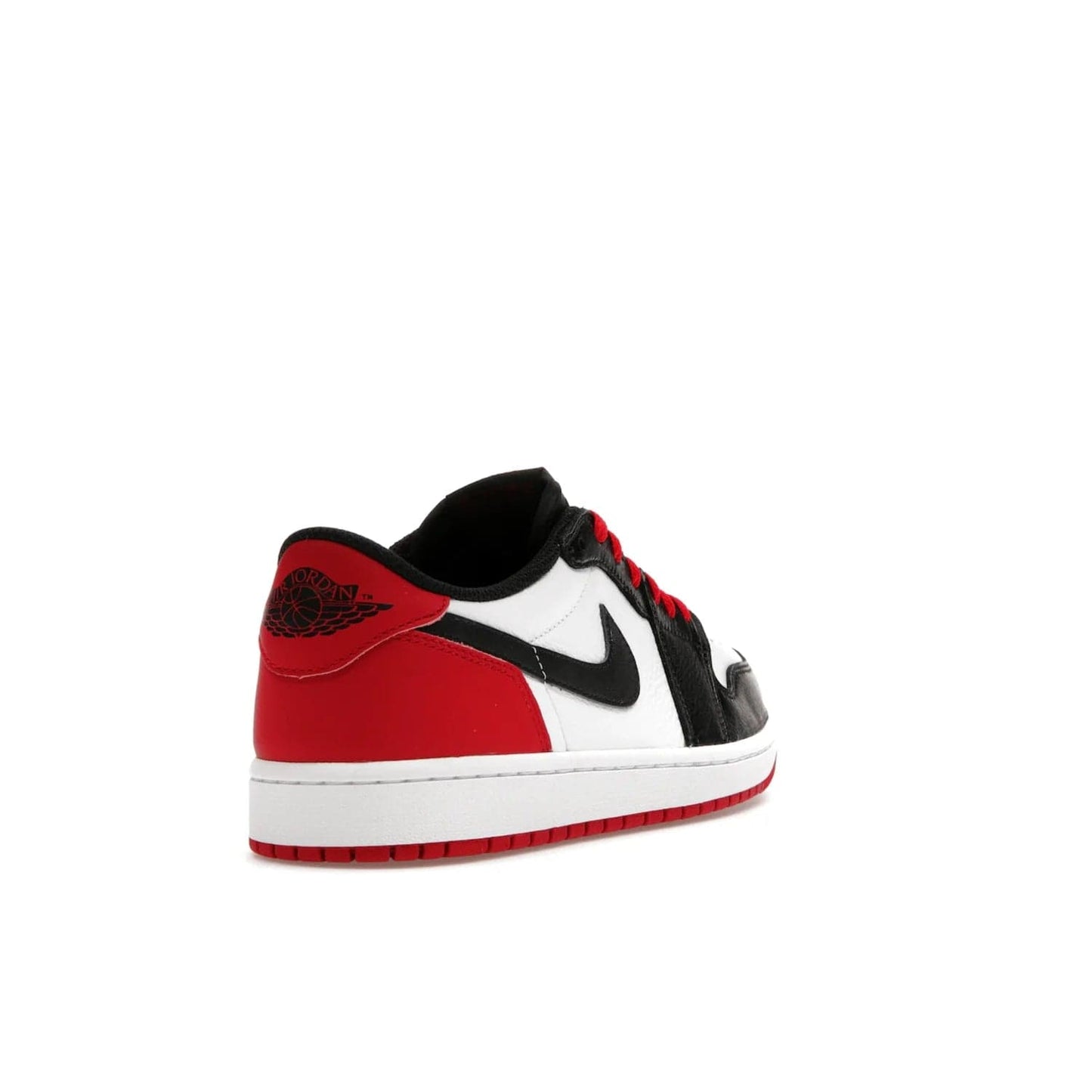Jordan 1 Retro Low OG Black Toe (2023) - Image 31 - Only at www.BallersClubKickz.com - Upgrade your wardrobe with the Jordan 1 Retro Low OG Black Toe featuring a classic black and white upper and dynamic red heel counter. Eye-catching white midsole and iconic black Swoosh and Wings complete the timeless yet modern look. Shop now to own this iconic shoe!