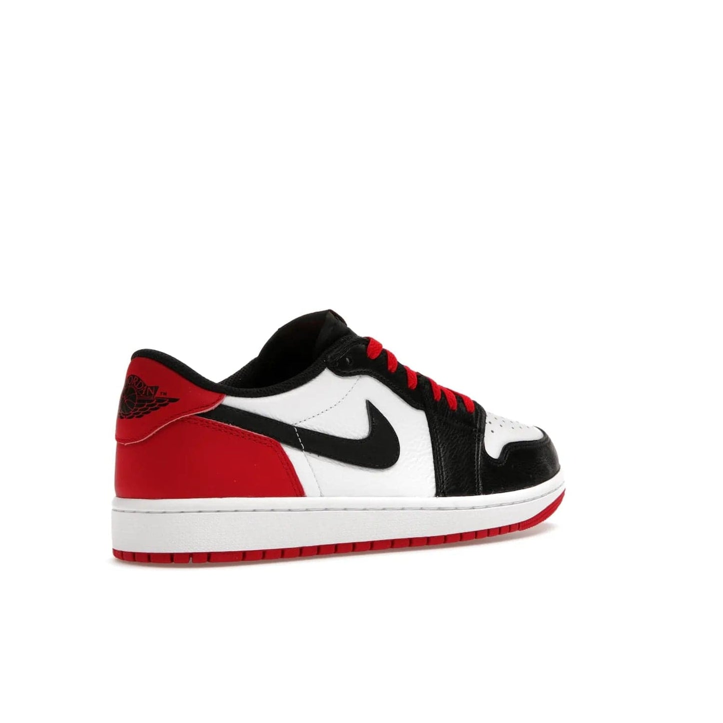 Jordan 1 Retro Low OG Black Toe (2023) - Image 33 - Only at www.BallersClubKickz.com - Upgrade your wardrobe with the Jordan 1 Retro Low OG Black Toe featuring a classic black and white upper and dynamic red heel counter. Eye-catching white midsole and iconic black Swoosh and Wings complete the timeless yet modern look. Shop now to own this iconic shoe!