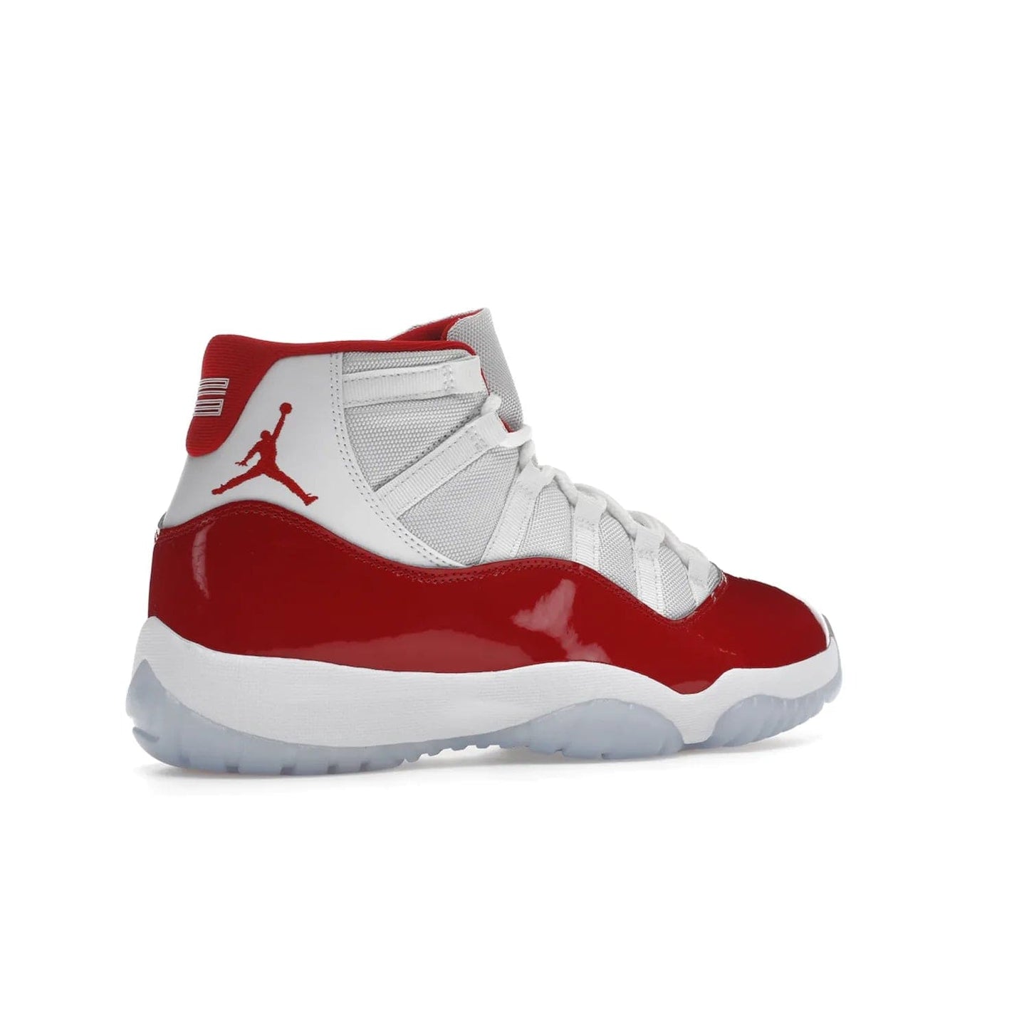 Jordan 11 Retro Cherry (2022) - Image 34 - Only at www.BallersClubKickz.com - The Air Jordan 11 Cherry features classic patent leather with Cherry red accents, icy blue outsole, and debossed 23 on the heel tab. Refresh your sneaker game with this iconic update, available December 10, 2022.