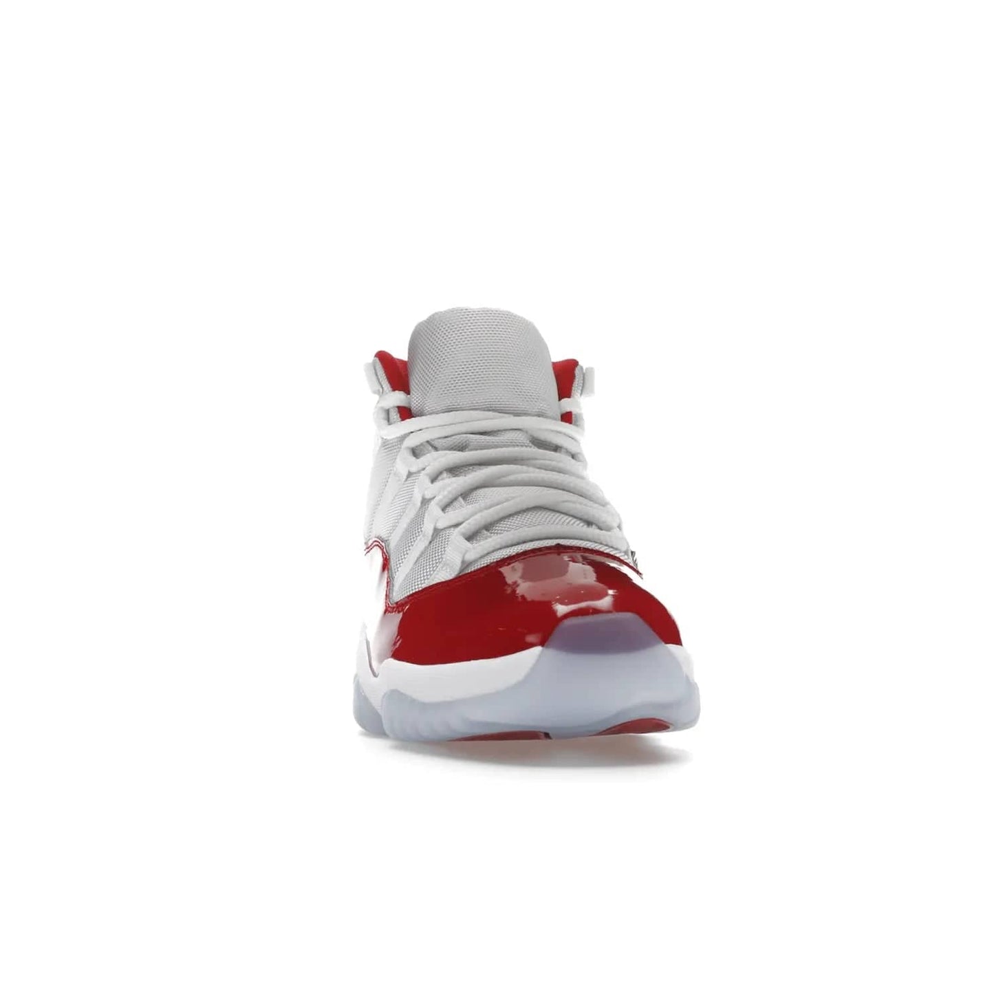 Jordan 11 Retro Cherry (2022) - Image 9 - Only at www.BallersClubKickz.com - The Air Jordan 11 Cherry features classic patent leather with Cherry red accents, icy blue outsole, and debossed 23 on the heel tab. Refresh your sneaker game with this iconic update, available December 10, 2022.