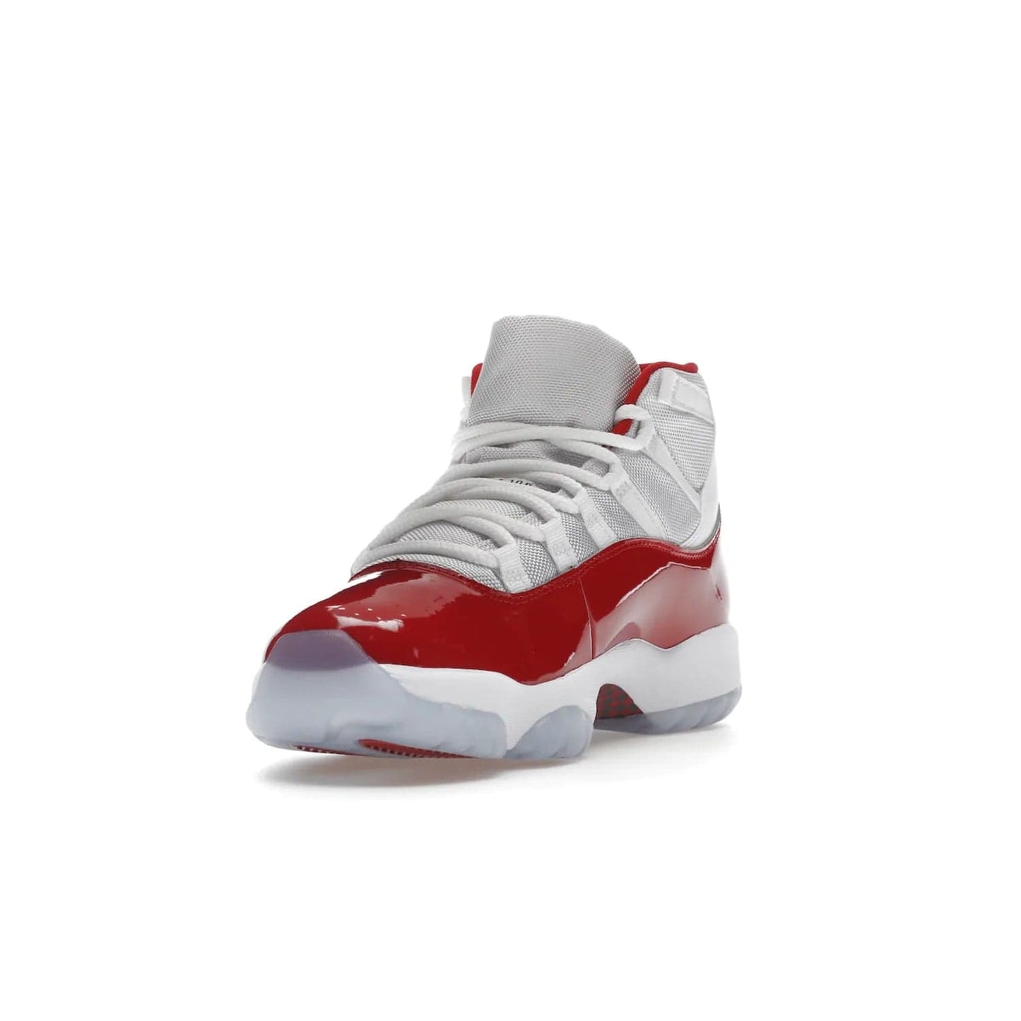 Jordan 11 Retro Cherry (2022) - Image 13 - Only at www.BallersClubKickz.com - The Air Jordan 11 Cherry features classic patent leather with Cherry red accents, icy blue outsole, and debossed 23 on the heel tab. Refresh your sneaker game with this iconic update, available December 10, 2022.