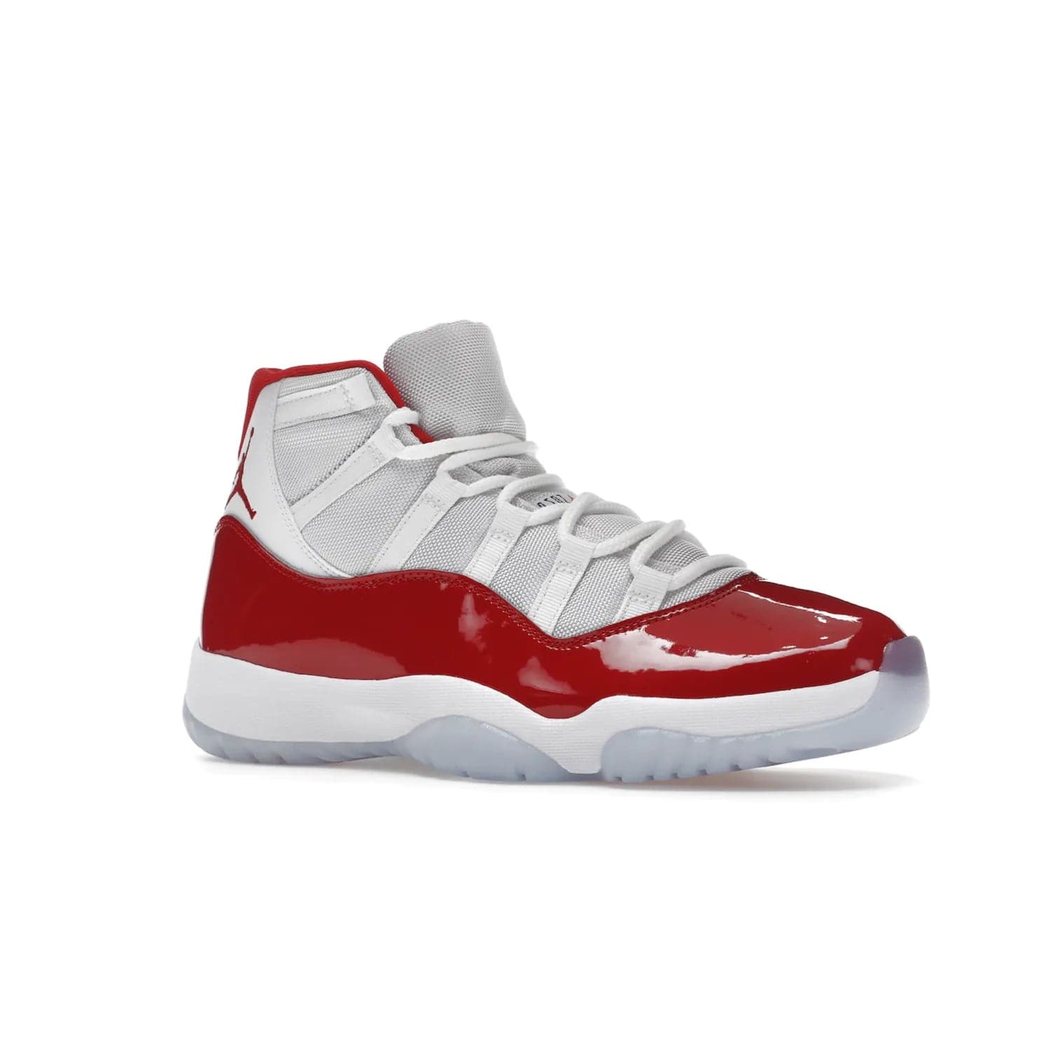 Jordan 11 Retro Cherry (2022) - Image 4 - Only at www.BallersClubKickz.com - The Air Jordan 11 Cherry features classic patent leather with Cherry red accents, icy blue outsole, and debossed 23 on the heel tab. Refresh your sneaker game with this iconic update, available December 10, 2022.
