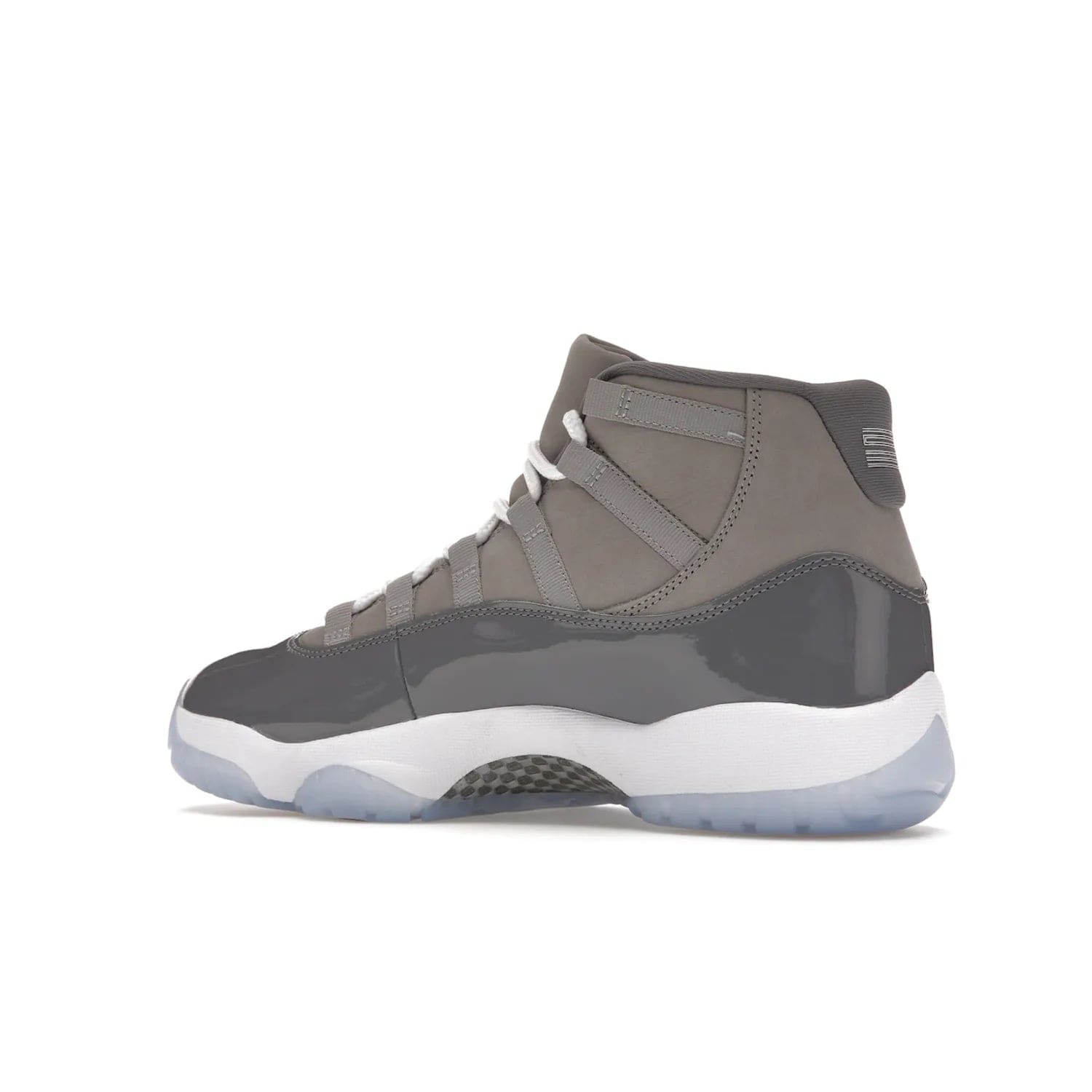 Jordan 11 Retro Cool Grey (2021) - Image 22 - Only at www.BallersClubKickz.com - Shop the Air Jordan 11 Retro Cool Grey (2021) for a must-have sneaker with a Cool Grey Durabuck upper, patent leather overlays, signature Jumpman embroidery, a white midsole, icy blue translucent outsole, and Multi-Color accents.  Released in December 2021 for $225.