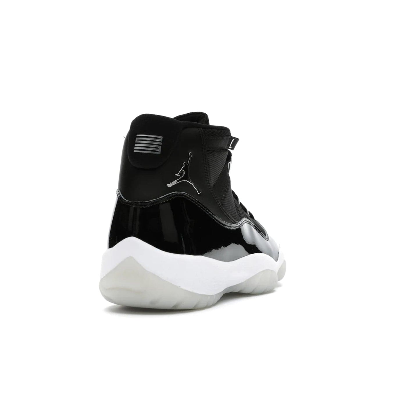 Jordan 11 Retro Jubilee 25th Anniversary - Image 30 - Only at www.BallersClubKickz.com - Celebrate 25 years of iconic style and performance with the Jordan 11 Retro Jubilee 25th Anniversary. Re-released by Nike and Michael Jordan in 2020 to commemorate the legendary Tinker Hatfield design, this shoe features a luxurious black leather upper, white midsole, and foggy translucent outsole. Carbon fiber plating ensures superior power and stability. Add this masterpiece to your collection today.