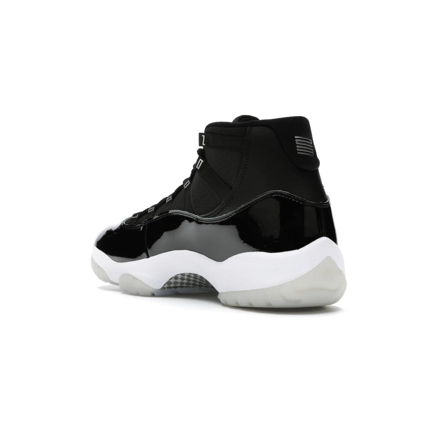 Jordan 11 Retro Jubilee 25th Anniversary - Image 24 - Only at www.BallersClubKickz.com - Celebrate 25 years of iconic style and performance with the Jordan 11 Retro Jubilee 25th Anniversary. Re-released by Nike and Michael Jordan in 2020 to commemorate the legendary Tinker Hatfield design, this shoe features a luxurious black leather upper, white midsole, and foggy translucent outsole. Carbon fiber plating ensures superior power and stability. Add this masterpiece to your collection today.