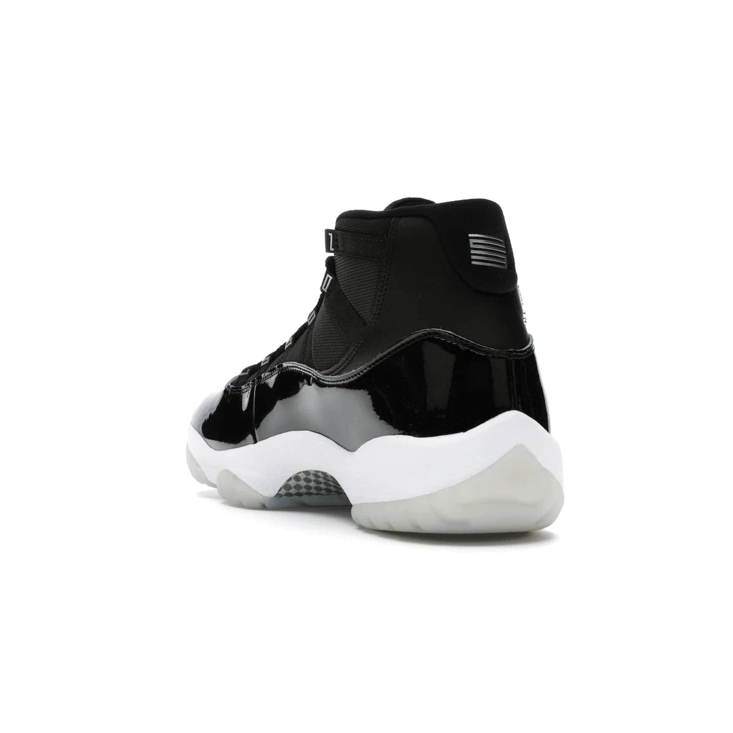 Jordan 11 Retro Jubilee 25th Anniversary - Image 25 - Only at www.BallersClubKickz.com - Celebrate 25 years of iconic style and performance with the Jordan 11 Retro Jubilee 25th Anniversary. Re-released by Nike and Michael Jordan in 2020 to commemorate the legendary Tinker Hatfield design, this shoe features a luxurious black leather upper, white midsole, and foggy translucent outsole. Carbon fiber plating ensures superior power and stability. Add this masterpiece to your collection today.