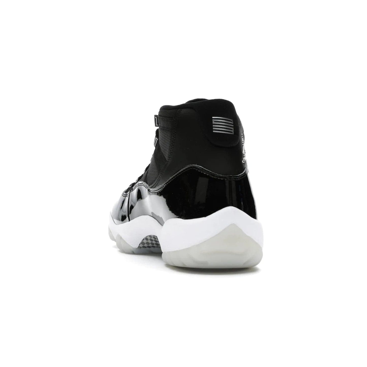 Jordan 11 Retro Jubilee 25th Anniversary - Image 26 - Only at www.BallersClubKickz.com - Celebrate 25 years of iconic style and performance with the Jordan 11 Retro Jubilee 25th Anniversary. Re-released by Nike and Michael Jordan in 2020 to commemorate the legendary Tinker Hatfield design, this shoe features a luxurious black leather upper, white midsole, and foggy translucent outsole. Carbon fiber plating ensures superior power and stability. Add this masterpiece to your collection today.