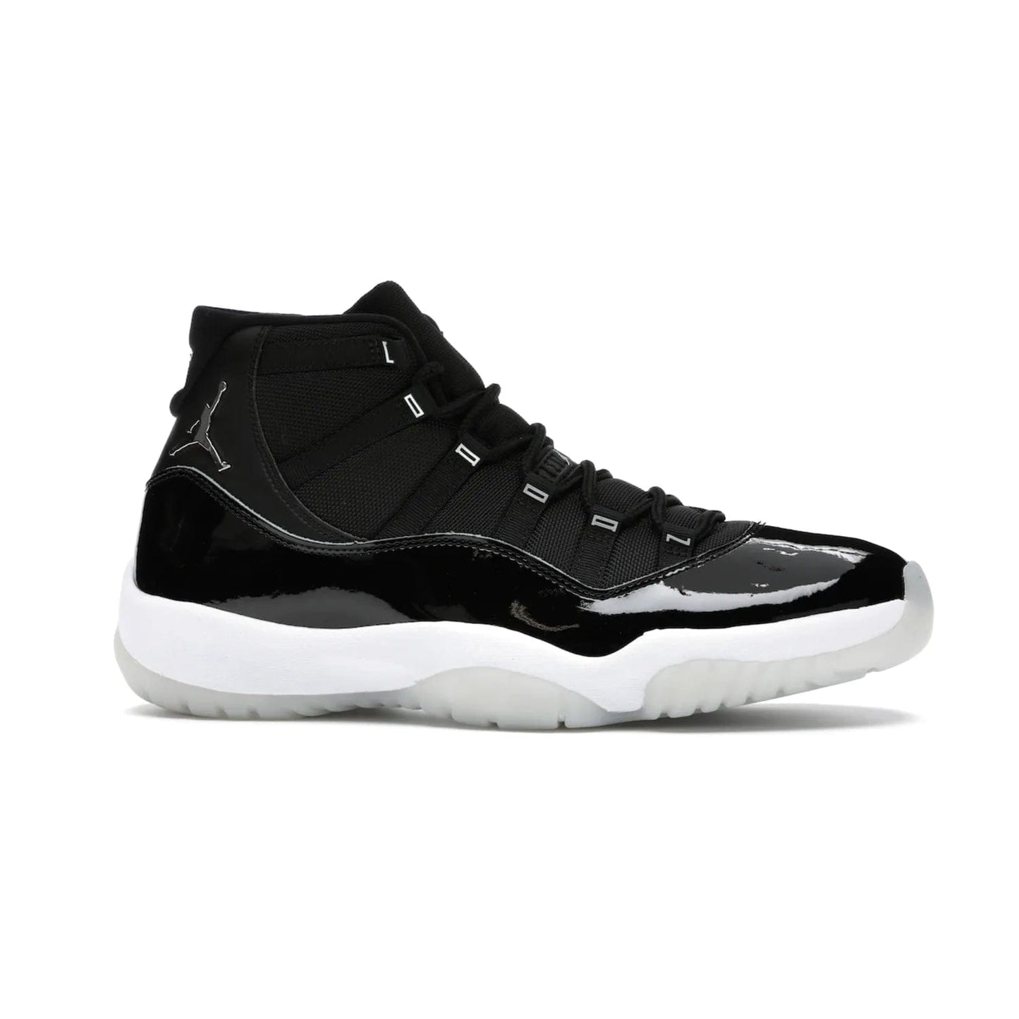 Jordan 11 Retro Jubilee 25th Anniversary - Image 2 - Only at www.BallersClubKickz.com - Celebrate 25 years of iconic style and performance with the Jordan 11 Retro Jubilee 25th Anniversary. Re-released by Nike and Michael Jordan in 2020 to commemorate the legendary Tinker Hatfield design, this shoe features a luxurious black leather upper, white midsole, and foggy translucent outsole. Carbon fiber plating ensures superior power and stability. Add this masterpiece to your collection today.
