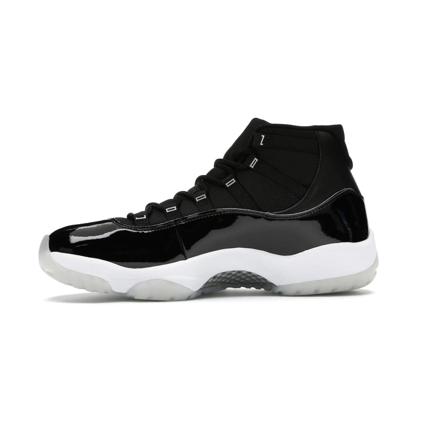 Jordan 11 Retro Jubilee 25th Anniversary - Image 18 - Only at www.BallersClubKickz.com - Celebrate 25 years of iconic style and performance with the Jordan 11 Retro Jubilee 25th Anniversary. Re-released by Nike and Michael Jordan in 2020 to commemorate the legendary Tinker Hatfield design, this shoe features a luxurious black leather upper, white midsole, and foggy translucent outsole. Carbon fiber plating ensures superior power and stability. Add this masterpiece to your collection today.