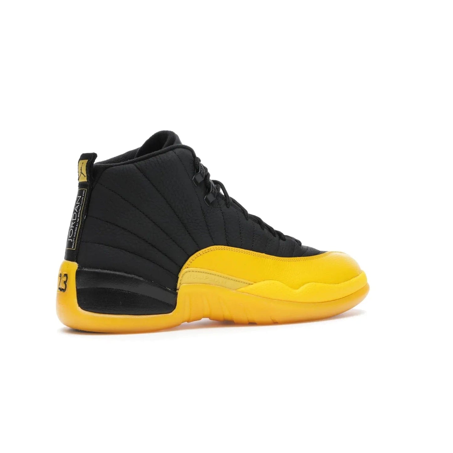 Jordan 12 Retro Black University Gold - Image 34 - Only at www.BallersClubKickz.com - This Jordan 12 Retro features a black tumbled leather upper and University Gold accents for a modern twist. Boasting Jordan "Two Three" branding and a yellow sole, these shoes will elevate your wardrobe. Fresh, sleek, and one of a kind - the Jordan 12 University Gold is your summer sneaker.