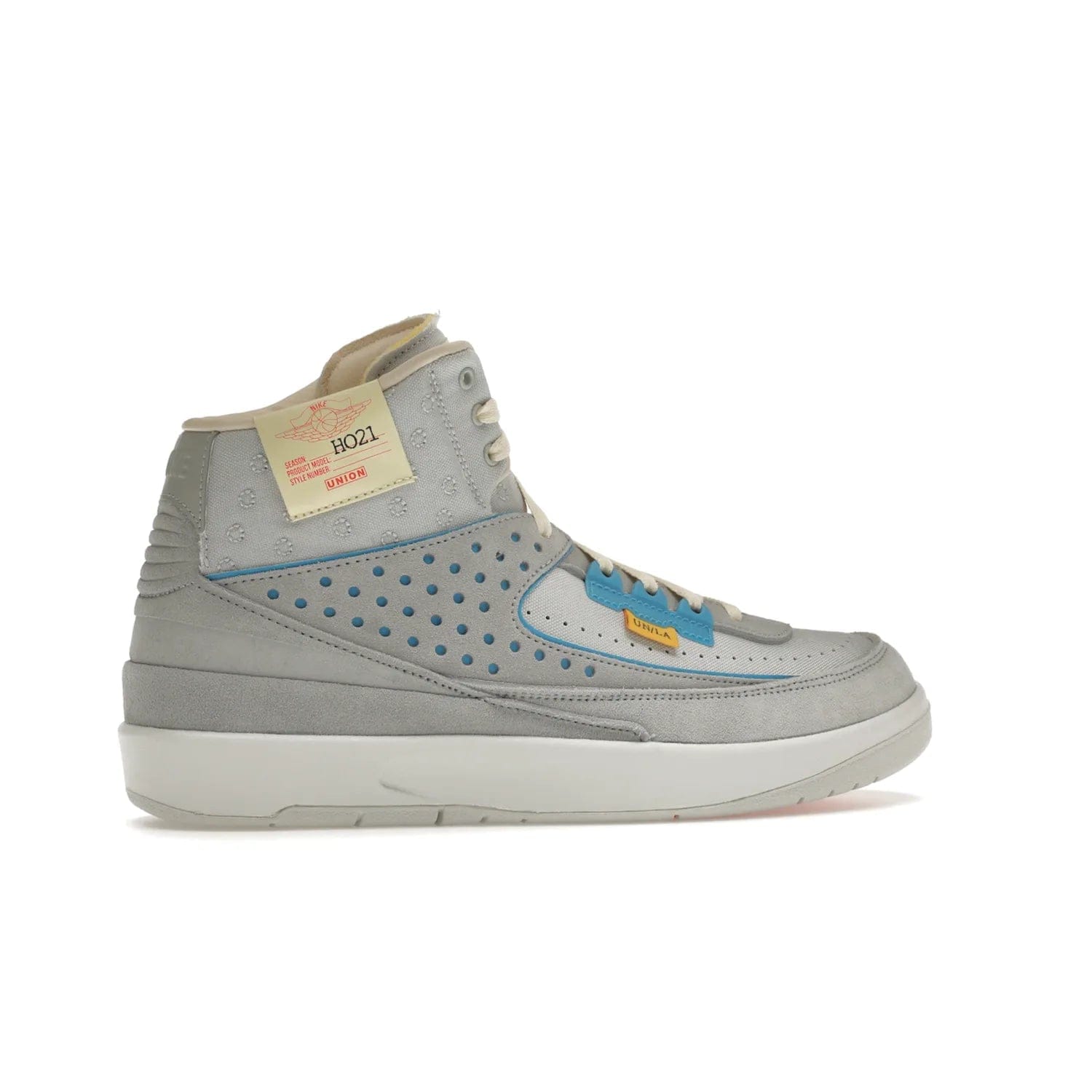Jordan 2 Retro SP Union Grey Fog - Image 35 - Only at www.BallersClubKickz.com - Introducing the Air Jordan 2 Retro SP Union Grey Fog. This intricate sneaker design features a grey canvas upper with light blue eyelets, eyestay patches, and piping, plus custom external tags. Dropping in April 2022, this exclusive release offers a worn-in look and feel.