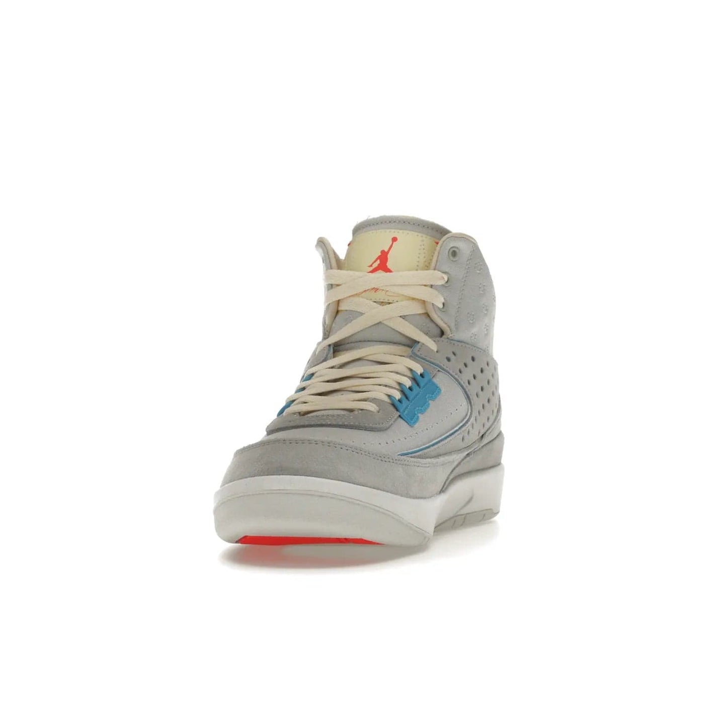 Jordan 2 Retro SP Union Grey Fog - Image 12 - Only at www.BallersClubKickz.com - Introducing the Air Jordan 2 Retro SP Union Grey Fog. This intricate sneaker design features a grey canvas upper with light blue eyelets, eyestay patches, and piping, plus custom external tags. Dropping in April 2022, this exclusive release offers a worn-in look and feel.
