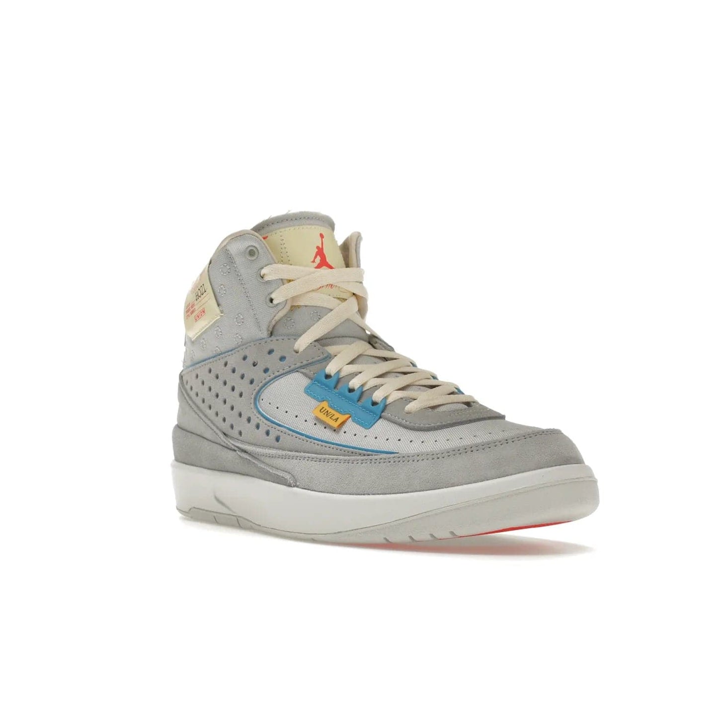 Jordan 2 Retro SP Union Grey Fog - Image 6 - Only at www.BallersClubKickz.com - Introducing the Air Jordan 2 Retro SP Union Grey Fog. This intricate sneaker design features a grey canvas upper with light blue eyelets, eyestay patches, and piping, plus custom external tags. Dropping in April 2022, this exclusive release offers a worn-in look and feel.