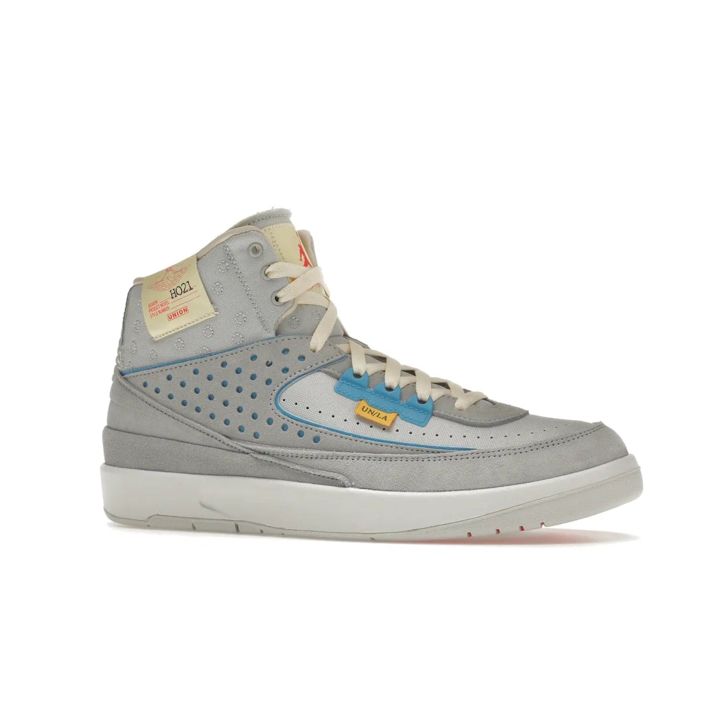 Jordan 2 Retro SP Union Grey Fog - Image 3 - Only at www.BallersClubKickz.com - Introducing the Air Jordan 2 Retro SP Union Grey Fog. This intricate sneaker design features a grey canvas upper with light blue eyelets, eyestay patches, and piping, plus custom external tags. Dropping in April 2022, this exclusive release offers a worn-in look and feel.