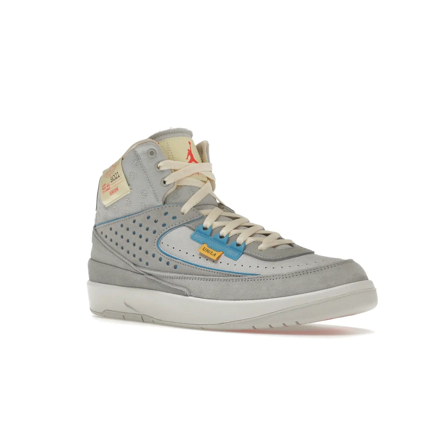 Jordan 2 Retro SP Union Grey Fog - Image 5 - Only at www.BallersClubKickz.com - Introducing the Air Jordan 2 Retro SP Union Grey Fog. This intricate sneaker design features a grey canvas upper with light blue eyelets, eyestay patches, and piping, plus custom external tags. Dropping in April 2022, this exclusive release offers a worn-in look and feel.