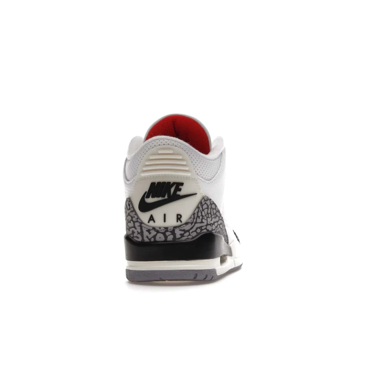 Jordan 3 Retro White Cement Reimagined - Image 29 - Only at www.BallersClubKickz.com - The Reimagined Air Jordan 3 Retro in a Summit White/Fire Red/Black/Cement Grey colorway is launching on March 11, 2023. Featuring a white leather upper, off-white midsoles and heel tabs, this vintage-look sneaker is a must-have.