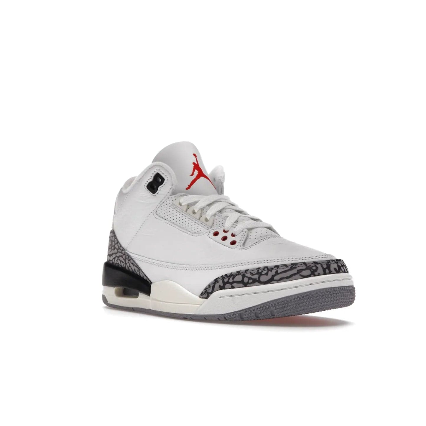 Jordan 3 Retro White Cement Reimagined - Image 6 - Only at www.BallersClubKickz.com - The Reimagined Air Jordan 3 Retro in a Summit White/Fire Red/Black/Cement Grey colorway is launching on March 11, 2023. Featuring a white leather upper, off-white midsoles and heel tabs, this vintage-look sneaker is a must-have.