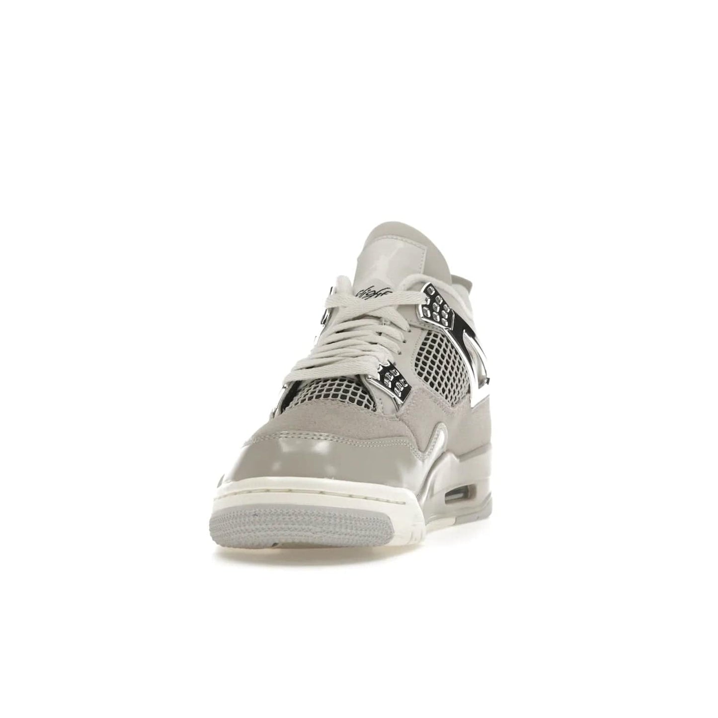 Jordan 4 Retro Frozen Moments (Women's) - Image 12 - Only at www.BallersClubKickz.com - The Jordan 4 Retro Frozen Moments is a stylish blend of classic design elements and modern tones. Featuring suede and leather overlays in a light iron-ore, sail, neutral grey, black, and metallic silver colorway. Get this iconic high-performance sneaker for $210.