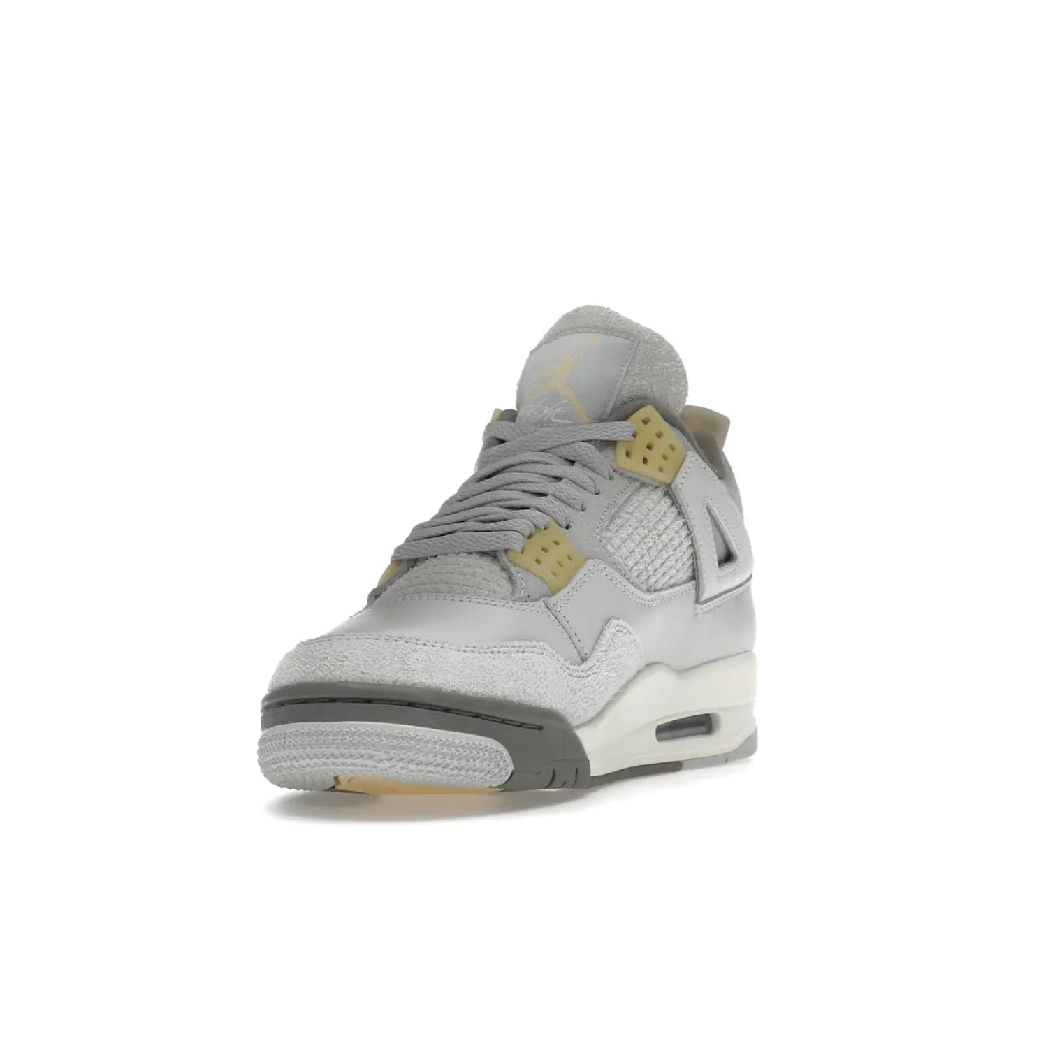 Jordan 4 Retro SE Craft Photon Dust - Image 13 - Only at www.BallersClubKickz.com - Upgrade your shoe collection with the Air Jordan 4 Retro SE Craft Photon Dust. This luxurious sneaker features a combination of suede and leather with unique grey tones like Photon Dust, Pale Vanilla, Off White, Grey Fog, Flat Pewter, and Sail. Available February 11, 2023.