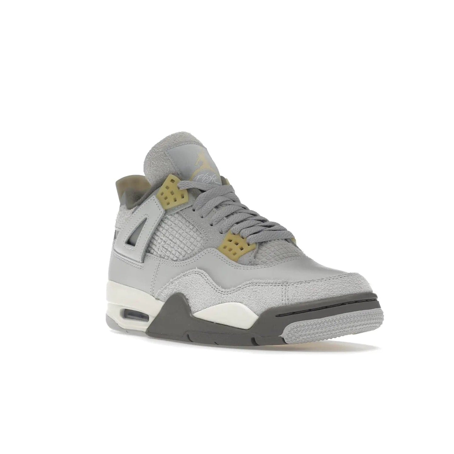 Jordan 4 Retro SE Craft Photon Dust - Image 6 - Only at www.BallersClubKickz.com - Upgrade your shoe collection with the Air Jordan 4 Retro SE Craft Photon Dust. This luxurious sneaker features a combination of suede and leather with unique grey tones like Photon Dust, Pale Vanilla, Off White, Grey Fog, Flat Pewter, and Sail. Available February 11, 2023.