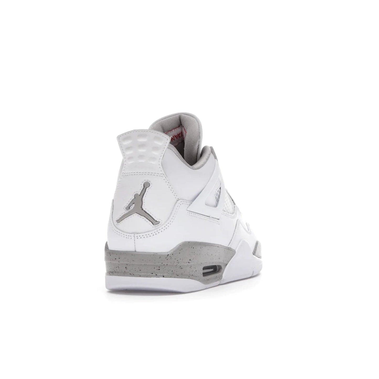 Jordan 4 Retro White Oreo (2021) - Image 30 - Only at www.BallersClubKickz.com - Update your sneaker style with the Air Jordan 4 Retro White Oreo. Limited-edition sneaker features white leather and mesh upper, Tech Grey eyelets and midsole, Jumpman logo embroidered on the tongue, and more. Released exclusively on Saturday, July 3rd.
