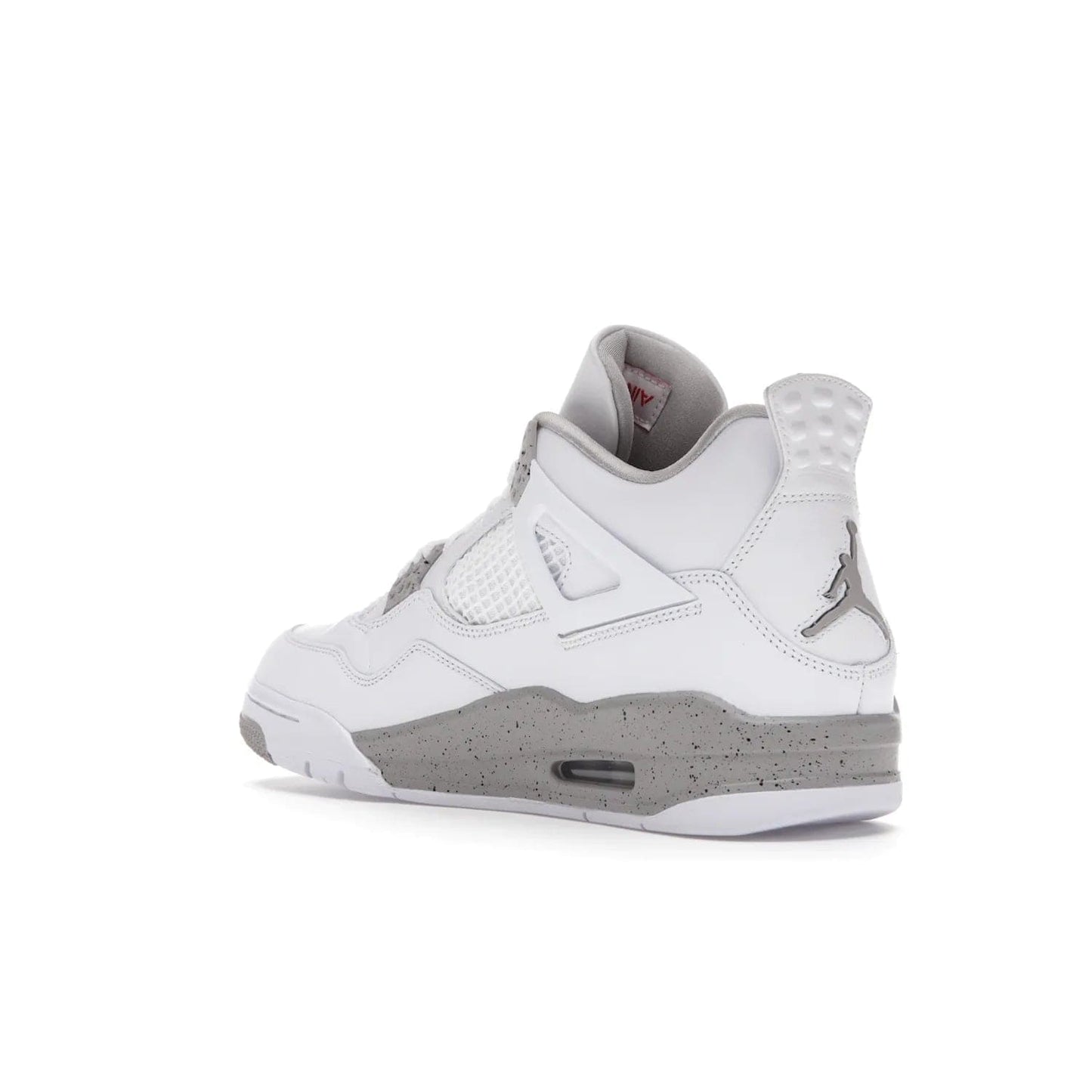Jordan 4 Retro White Oreo (2021) - Image 24 - Only at www.BallersClubKickz.com - Update your sneaker style with the Air Jordan 4 Retro White Oreo. Limited-edition sneaker features white leather and mesh upper, Tech Grey eyelets and midsole, Jumpman logo embroidered on the tongue, and more. Released exclusively on Saturday, July 3rd.
