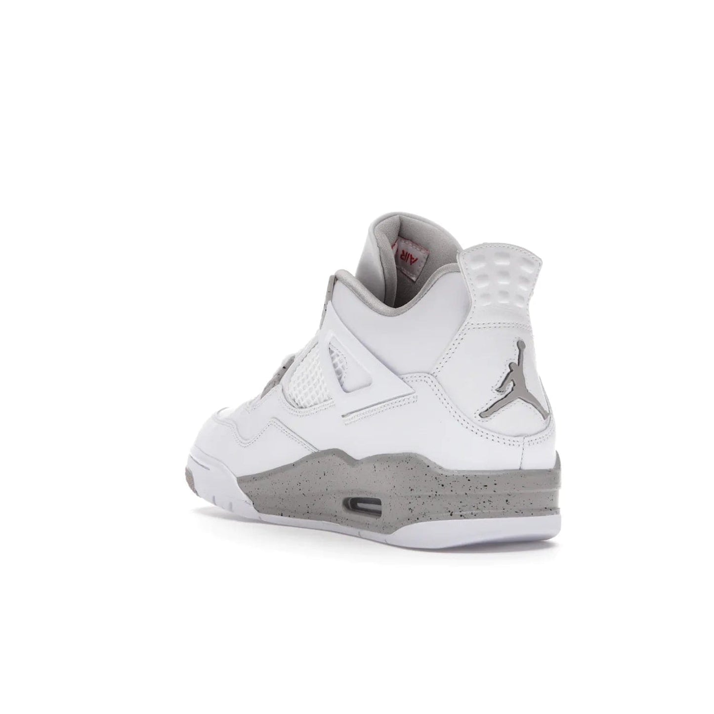 Jordan 4 Retro White Oreo (2021) - Image 25 - Only at www.BallersClubKickz.com - Update your sneaker style with the Air Jordan 4 Retro White Oreo. Limited-edition sneaker features white leather and mesh upper, Tech Grey eyelets and midsole, Jumpman logo embroidered on the tongue, and more. Released exclusively on Saturday, July 3rd.