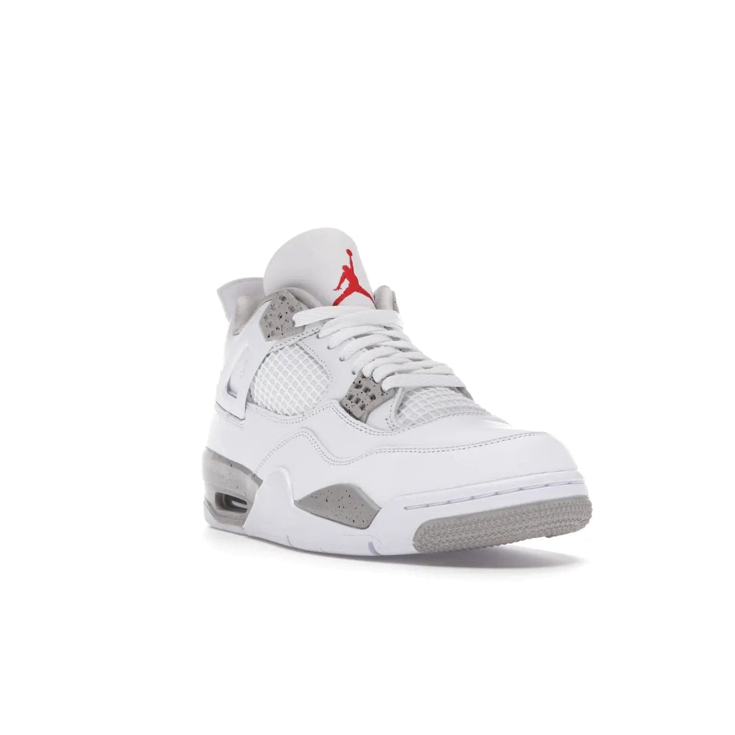 Jordan 4 Retro White Oreo (2021) - Image 7 - Only at www.BallersClubKickz.com - Update your sneaker style with the Air Jordan 4 Retro White Oreo. Limited-edition sneaker features white leather and mesh upper, Tech Grey eyelets and midsole, Jumpman logo embroidered on the tongue, and more. Released exclusively on Saturday, July 3rd.