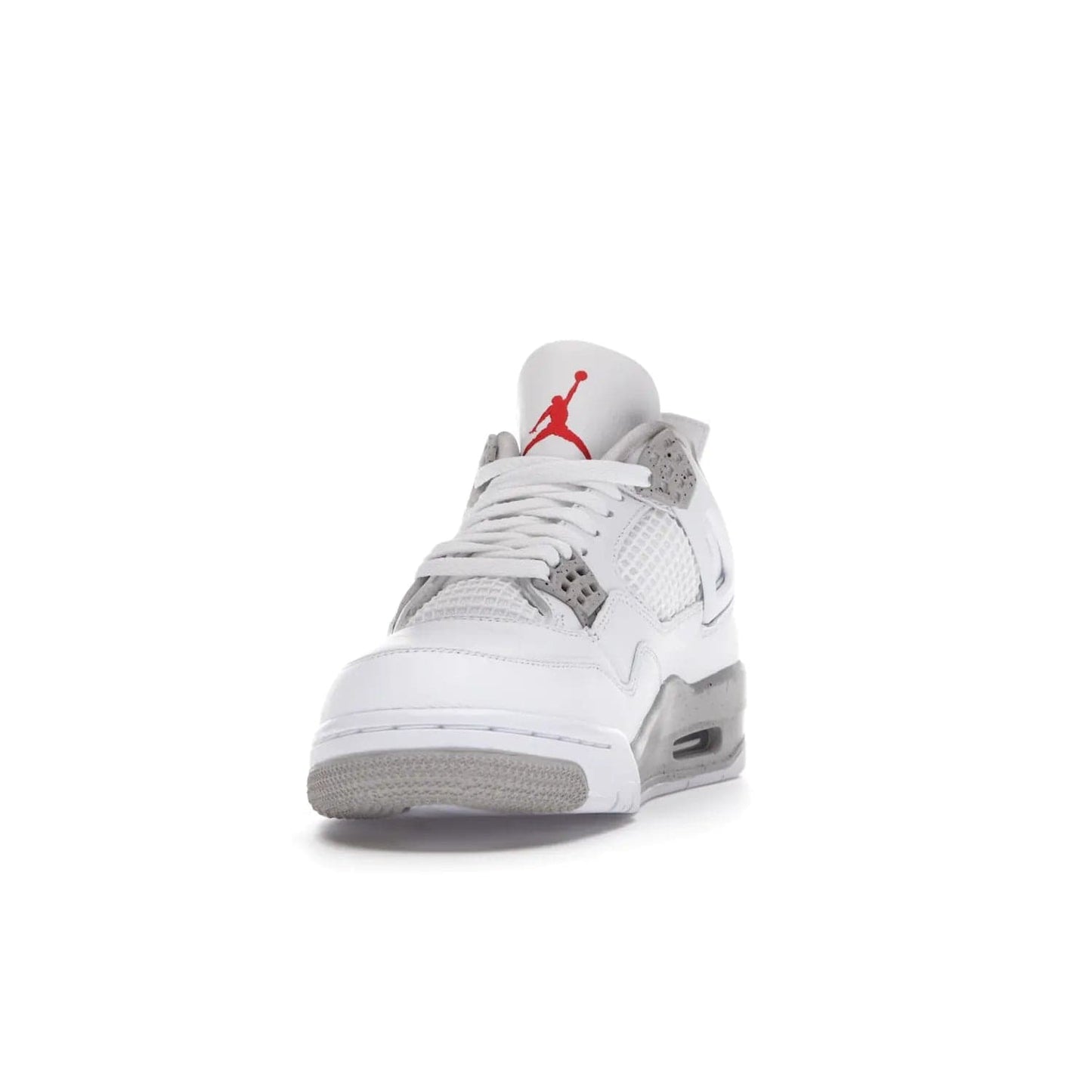 Jordan 4 Retro White Oreo (2021) - Image 12 - Only at www.BallersClubKickz.com - Update your sneaker style with the Air Jordan 4 Retro White Oreo. Limited-edition sneaker features white leather and mesh upper, Tech Grey eyelets and midsole, Jumpman logo embroidered on the tongue, and more. Released exclusively on Saturday, July 3rd.