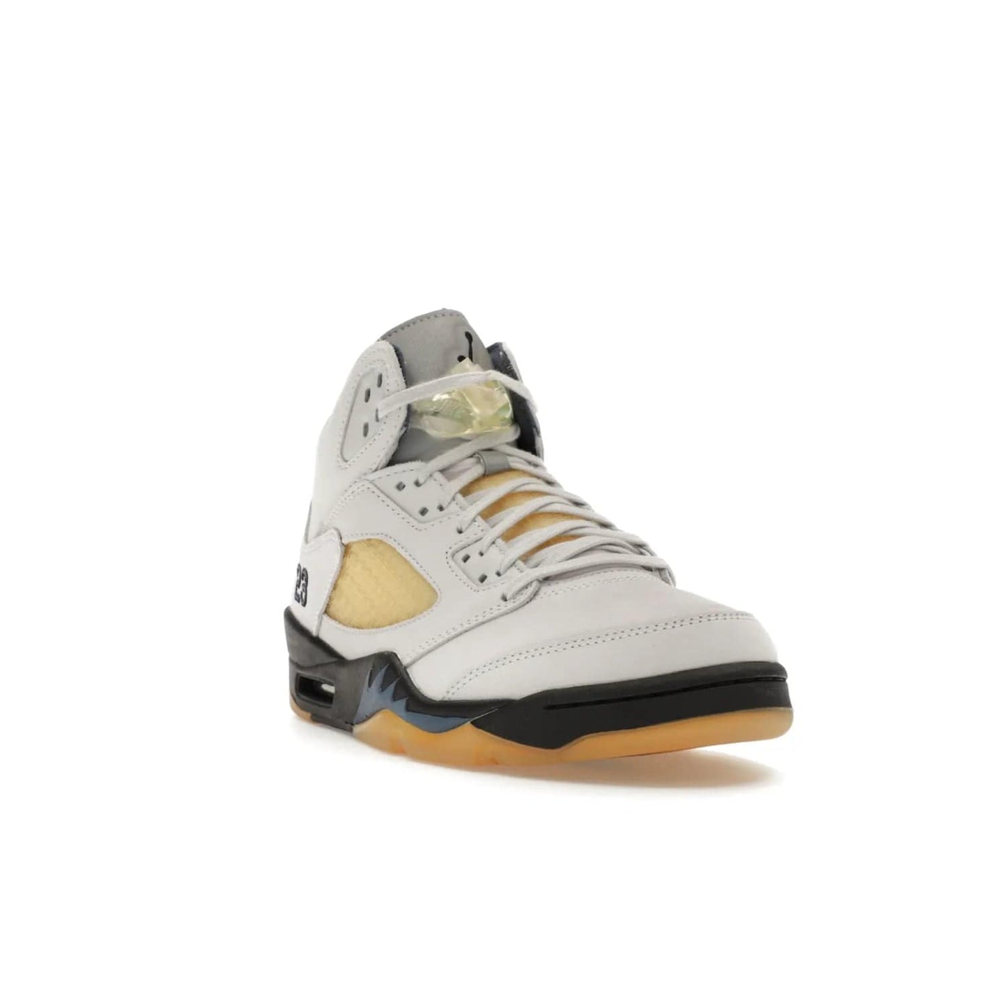 Jordan 5 Retro A Ma Maniére Dawn (Women's) - Image 7 - Only at www.BallersClubKickz.com - Catch the exclusive Air Jordan 5 Retro A Ma Maniére "Dawn" – a modern classic that combines elegance and street style. Get a gleaming metallic silver tongue, the iconic "23" heel, and signature shark teeth pattern. A Photon Dust/Black/Diffused Blue/Pale Ivory colorway, slimmed-down collar, and pre-yellowed quarter panel netting make this sneaker a must-have. Get your pair on November 17 and seize